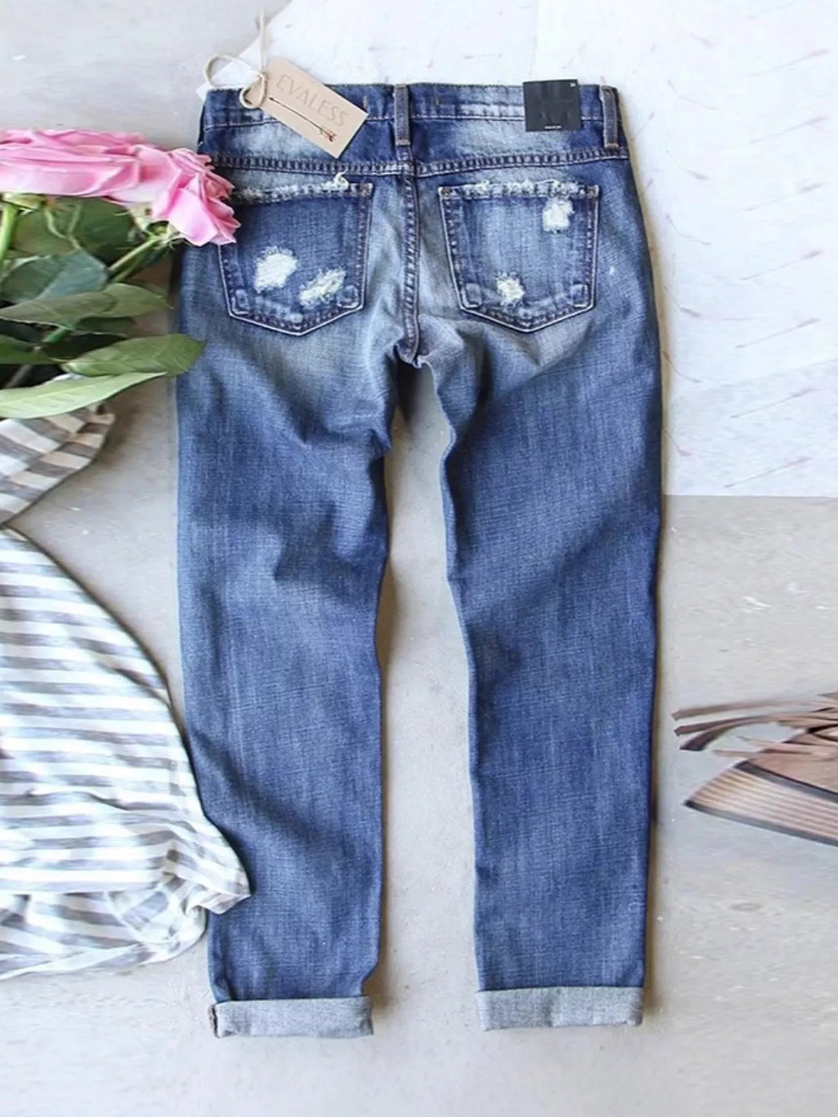 Blue distressed santa claus print jeans, back view