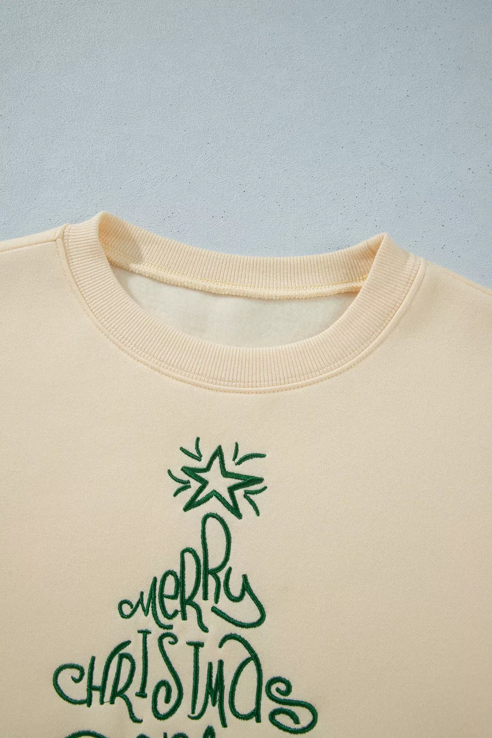 Christmas tree lettering on cream christmas tree merry christmas and happy new year sweatshirt