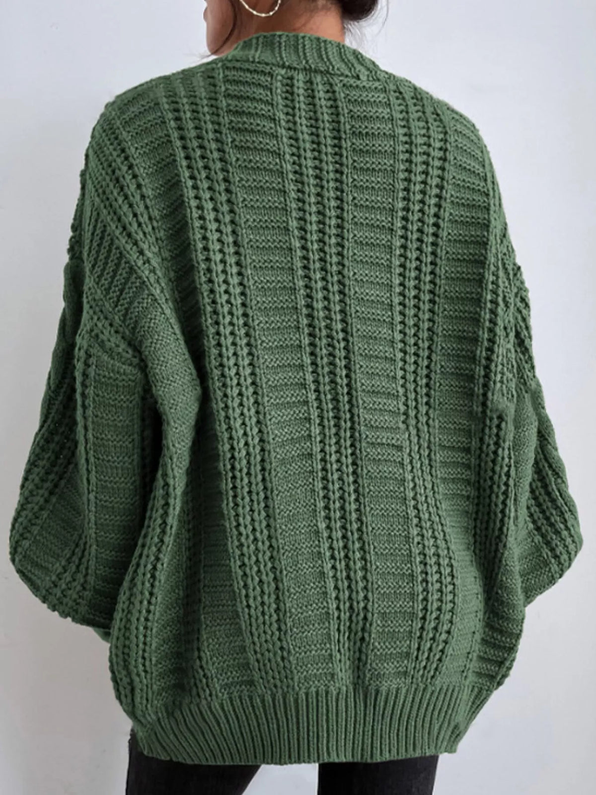 Green cable knit button-down cardigan, back view