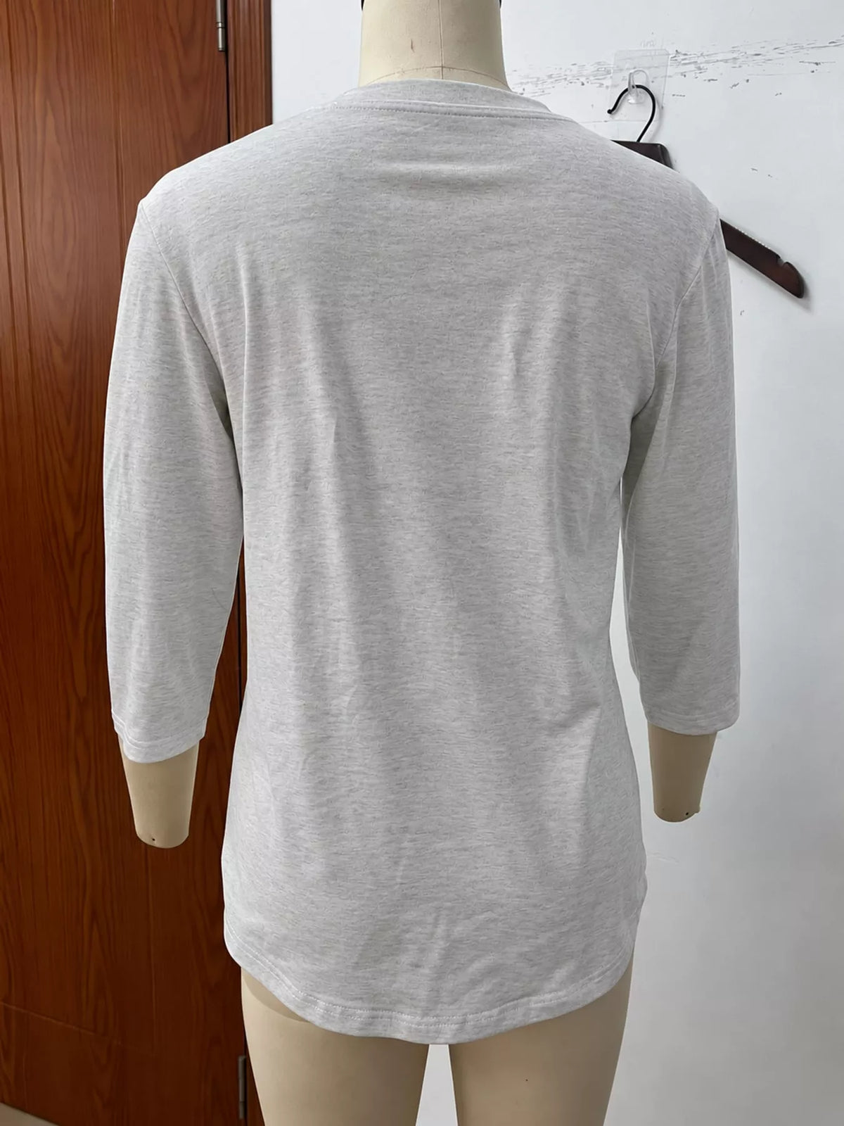 Gray v-neck half sleeve t-shirt, back view