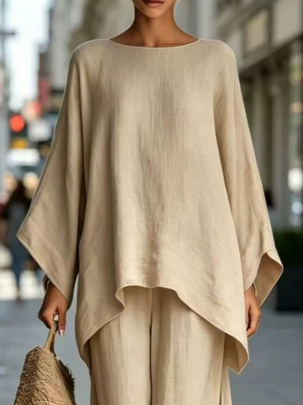 Khaki batwing top, neckline and hem view