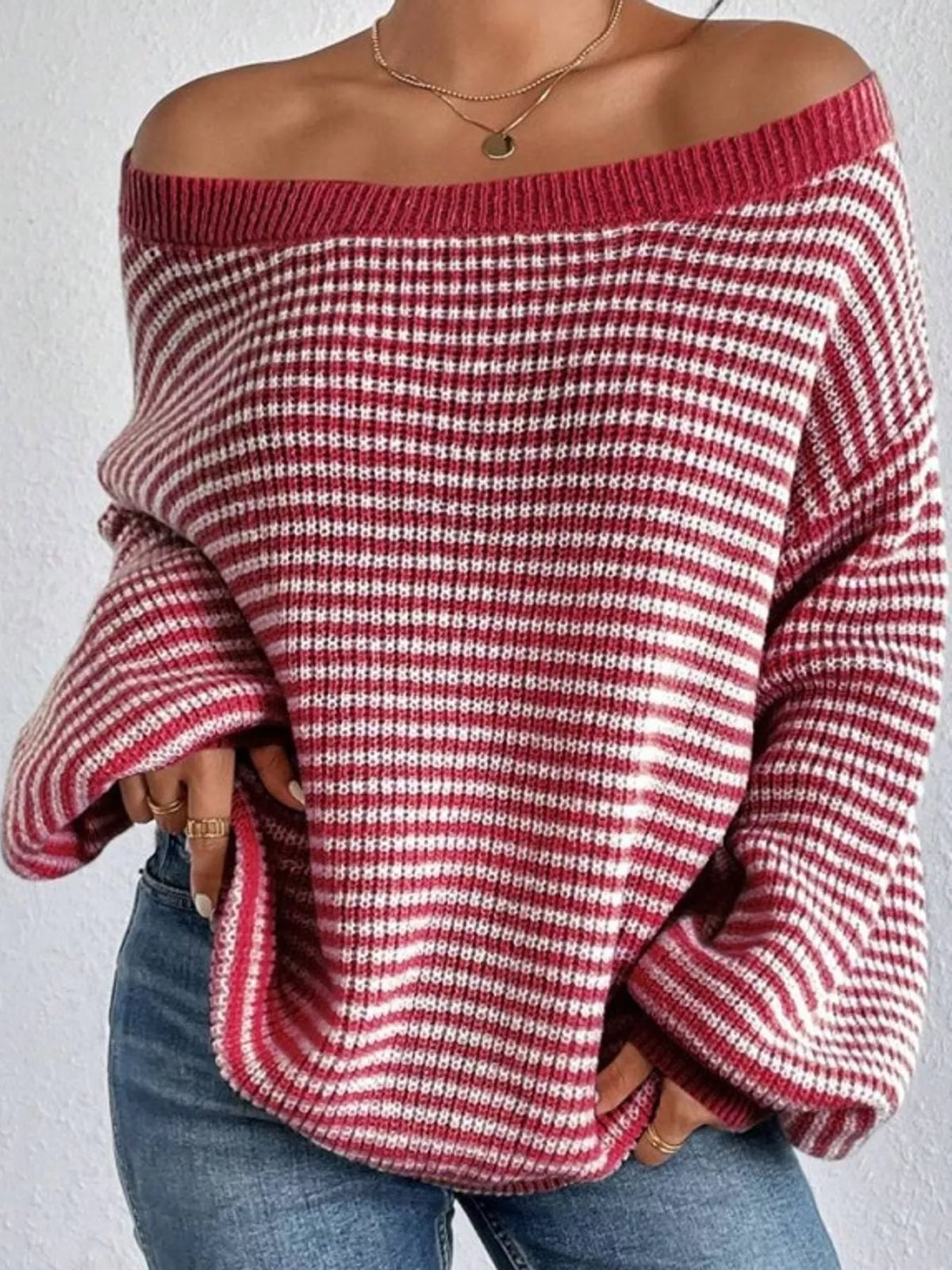 Red and white striped knit boat neck sweater