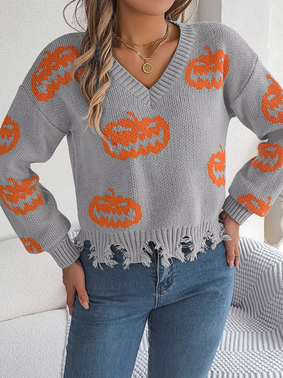 Pumpkin Distressed Hem Sweater in gray, front view