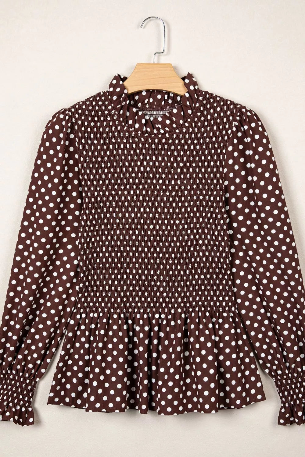 Brown polka dot polka dot high neck ruffled peplum blouse — front view