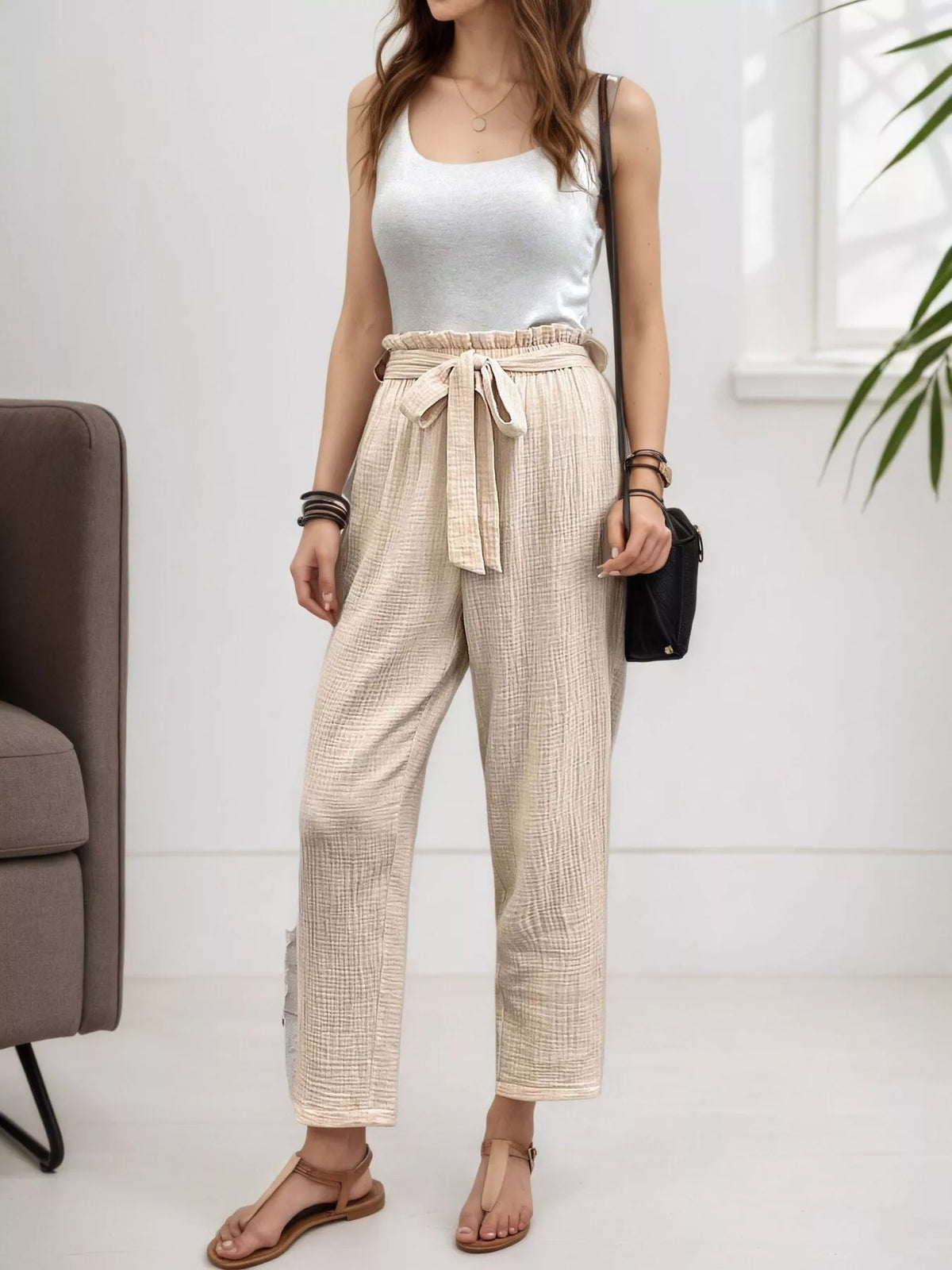 Beige high waisted paperbag waist textured casual pants, front view