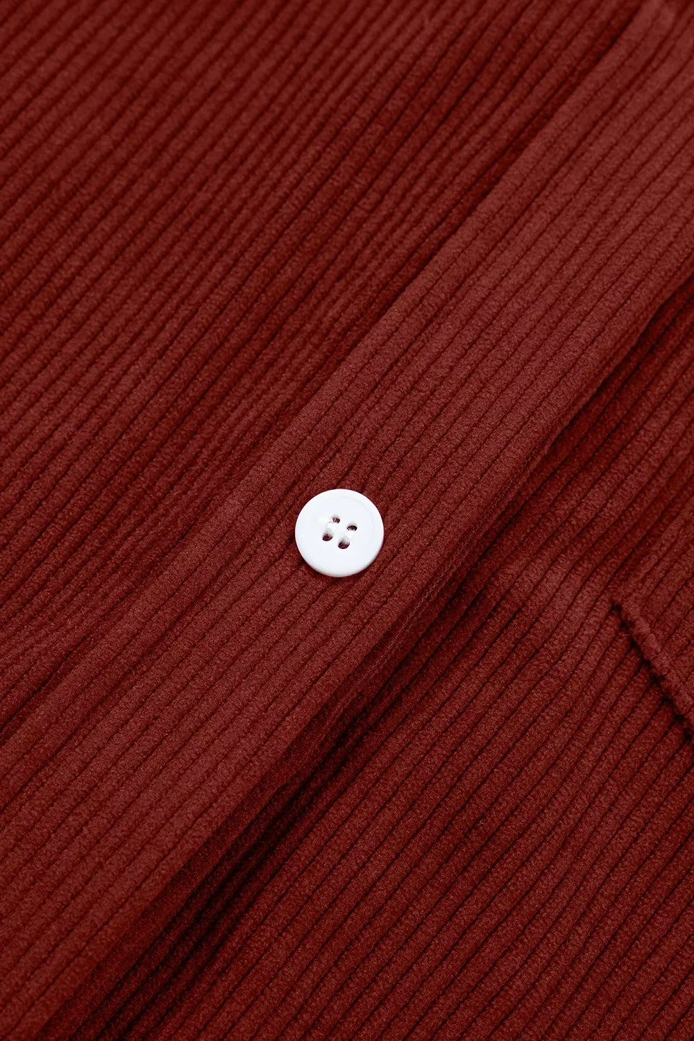 Rust corduroy button-down shirt, button placket detail