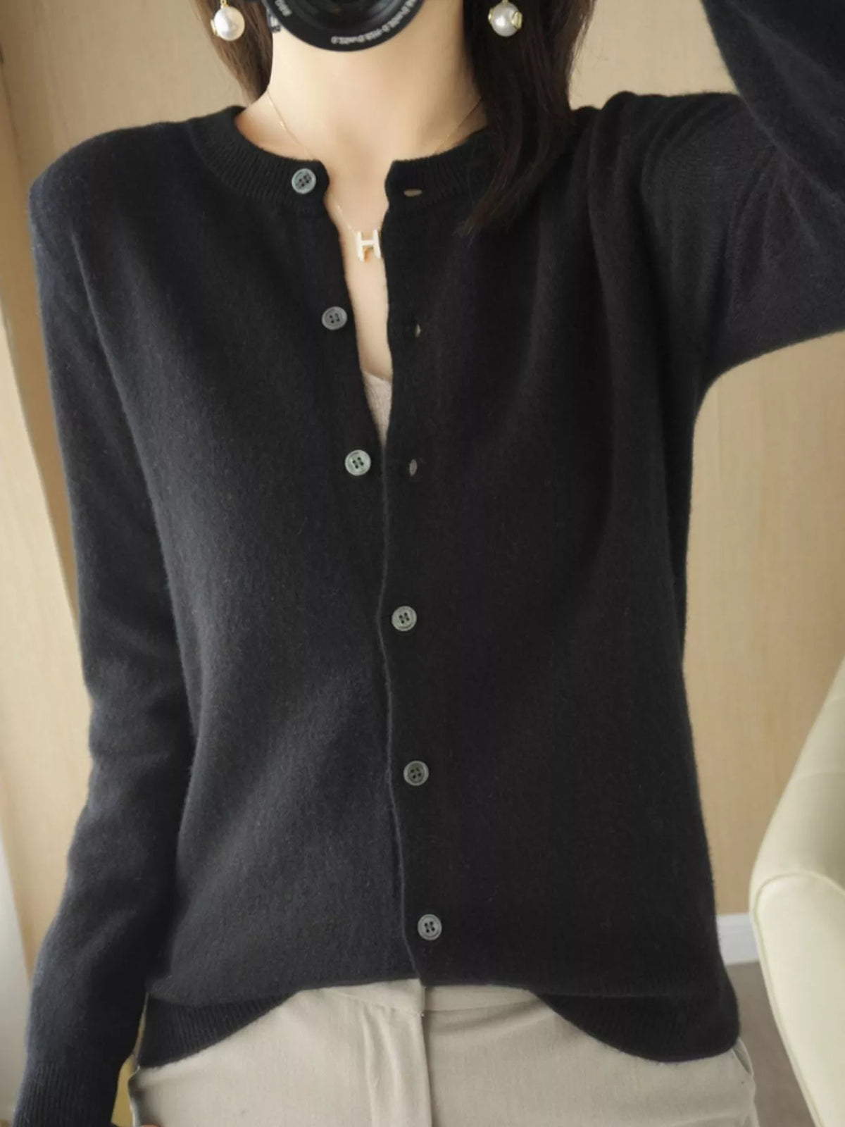 Black crew neck button-front cardigan