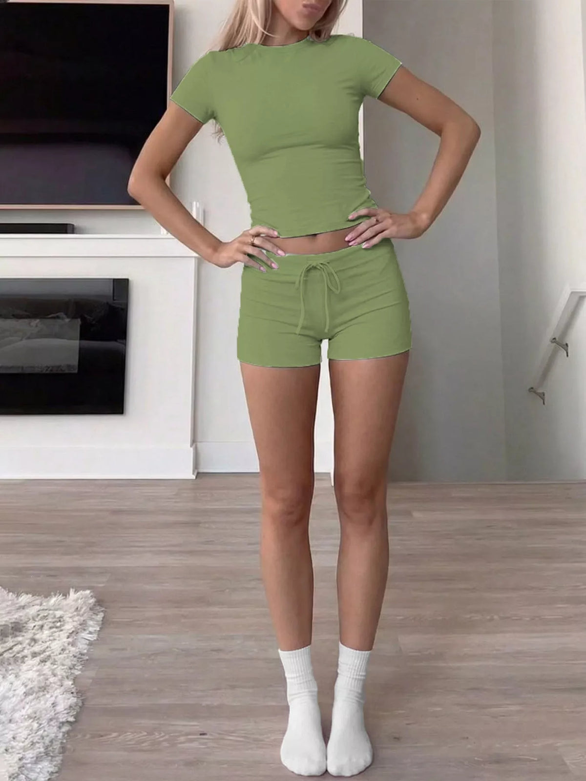 Green crop top and drawstring shorts set, front view