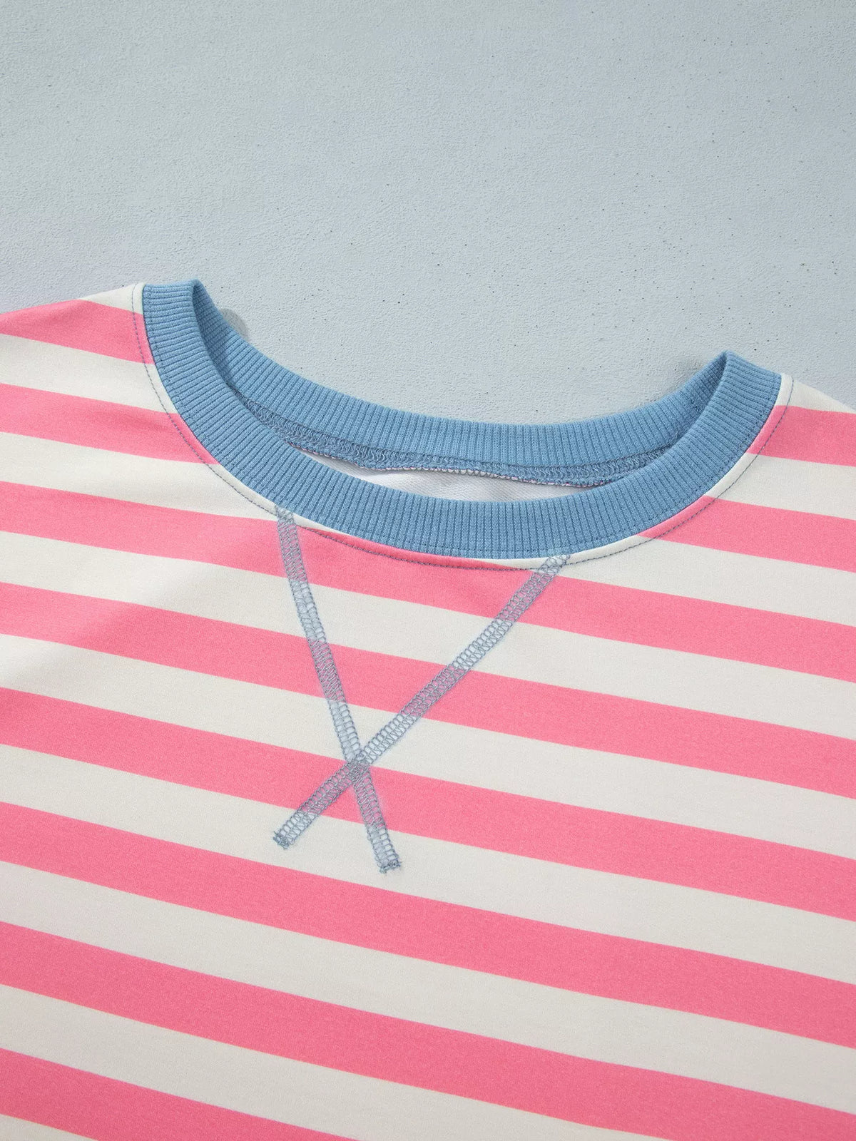 Pink white and blue striped crewneck tunic sweatshirt, neckline detail