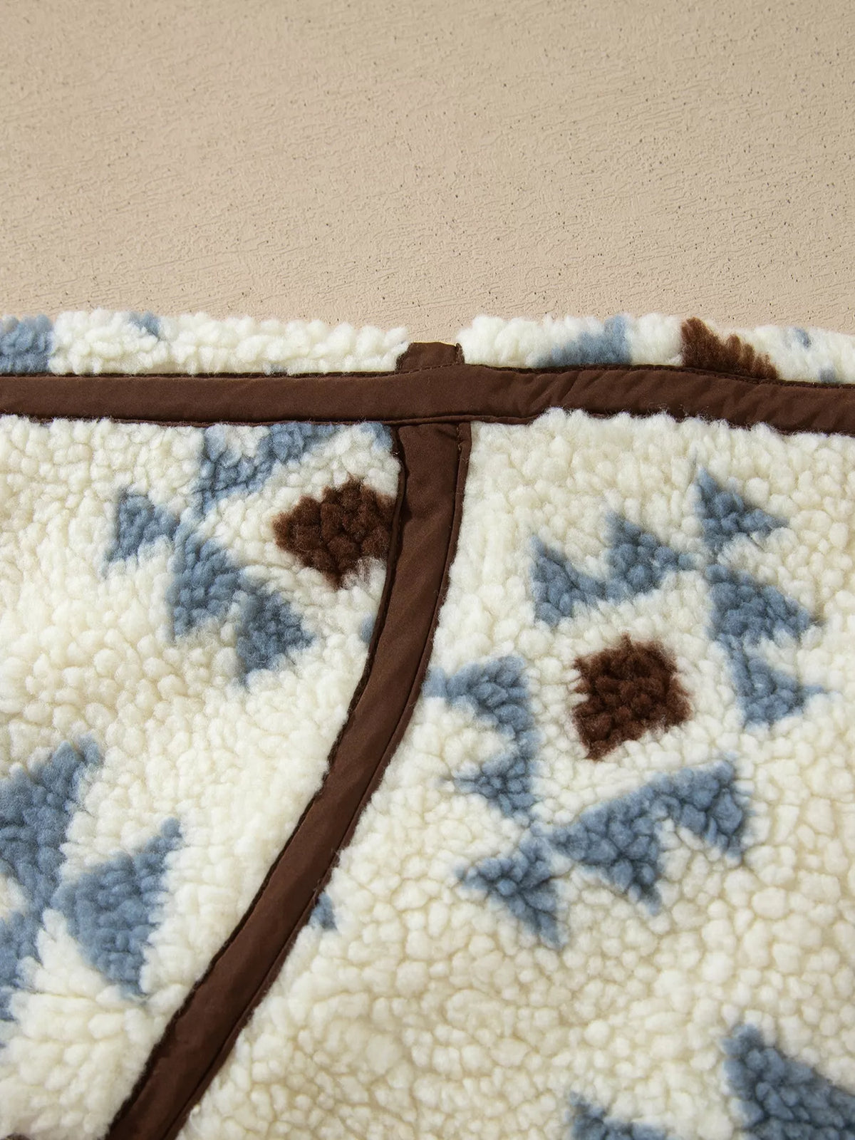 Cream blue and brown geometric print sherpa sweatshirt, contrast seam detail
