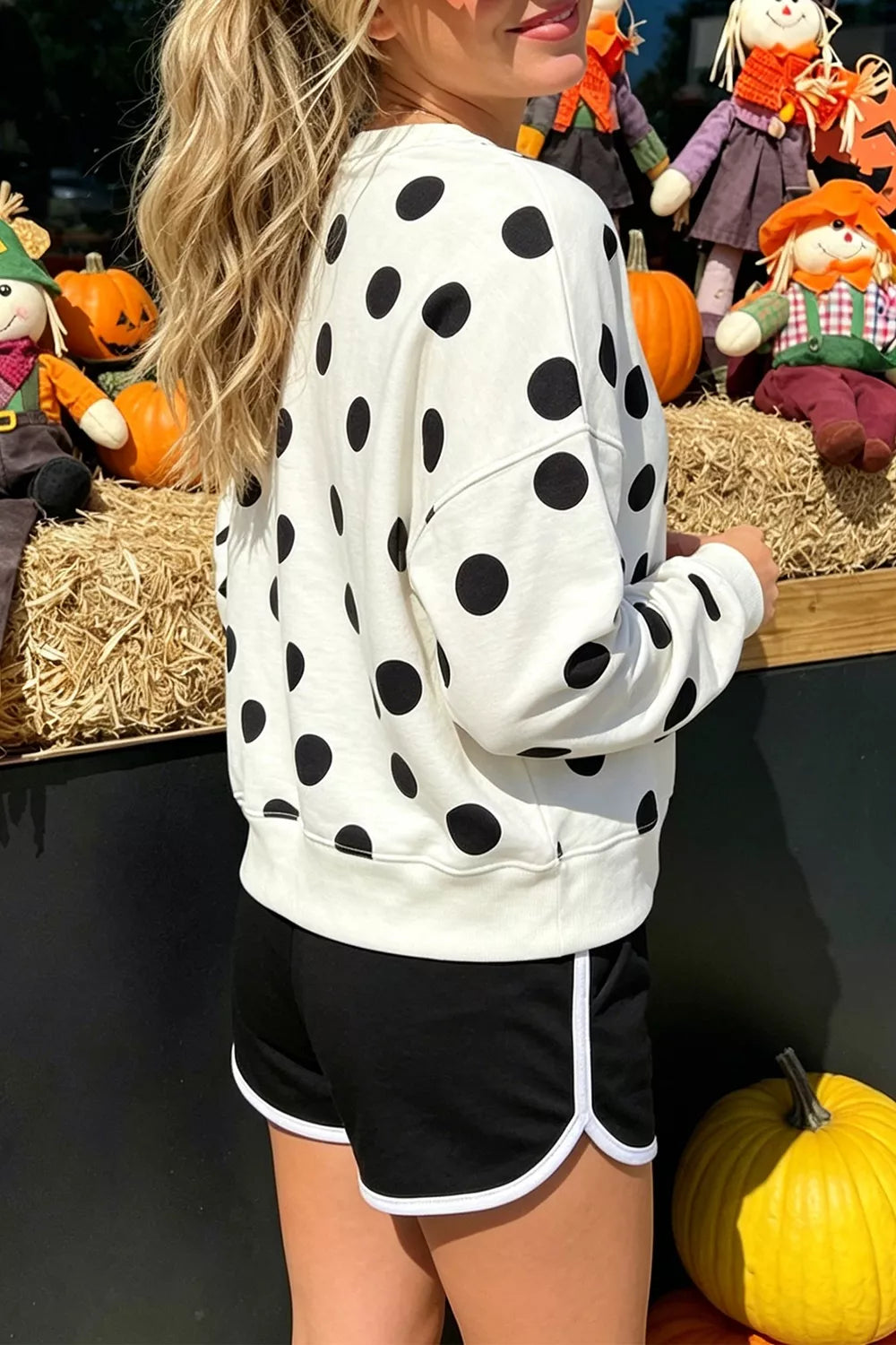 White polka dot round neck sweatshirt, back view