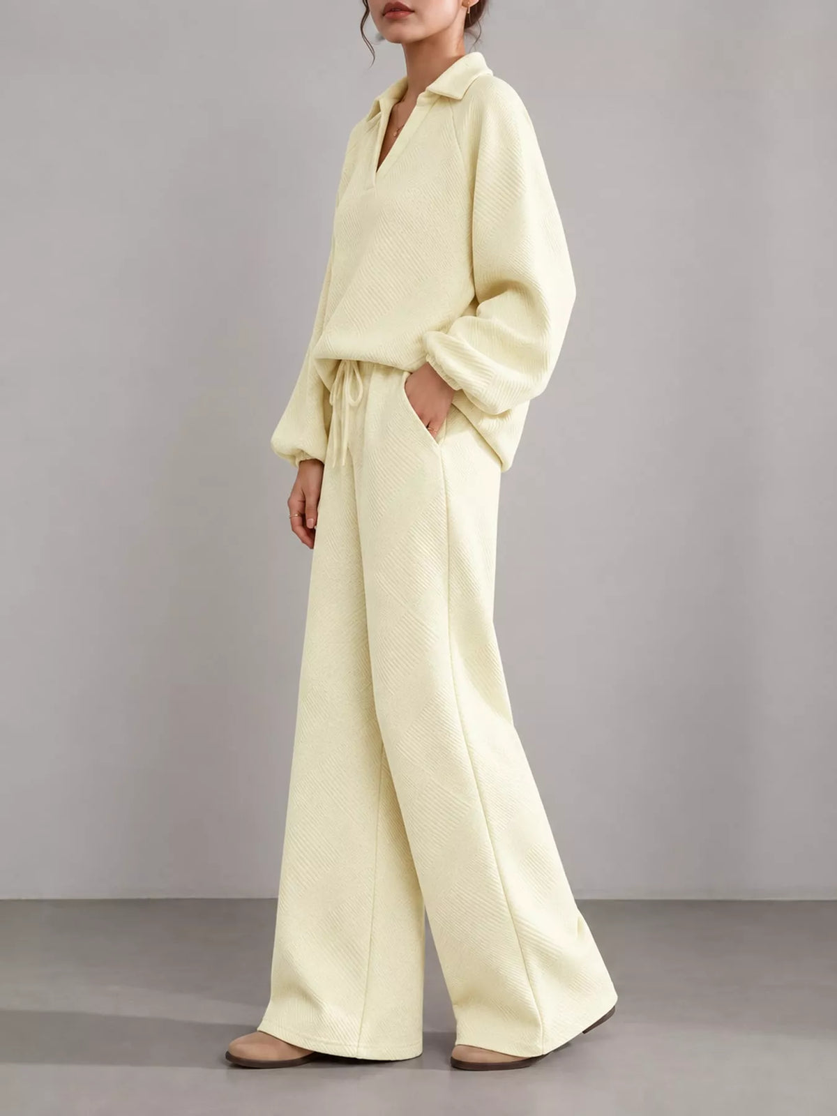 Yellow textured polo collar top and wide-leg pants set — side view