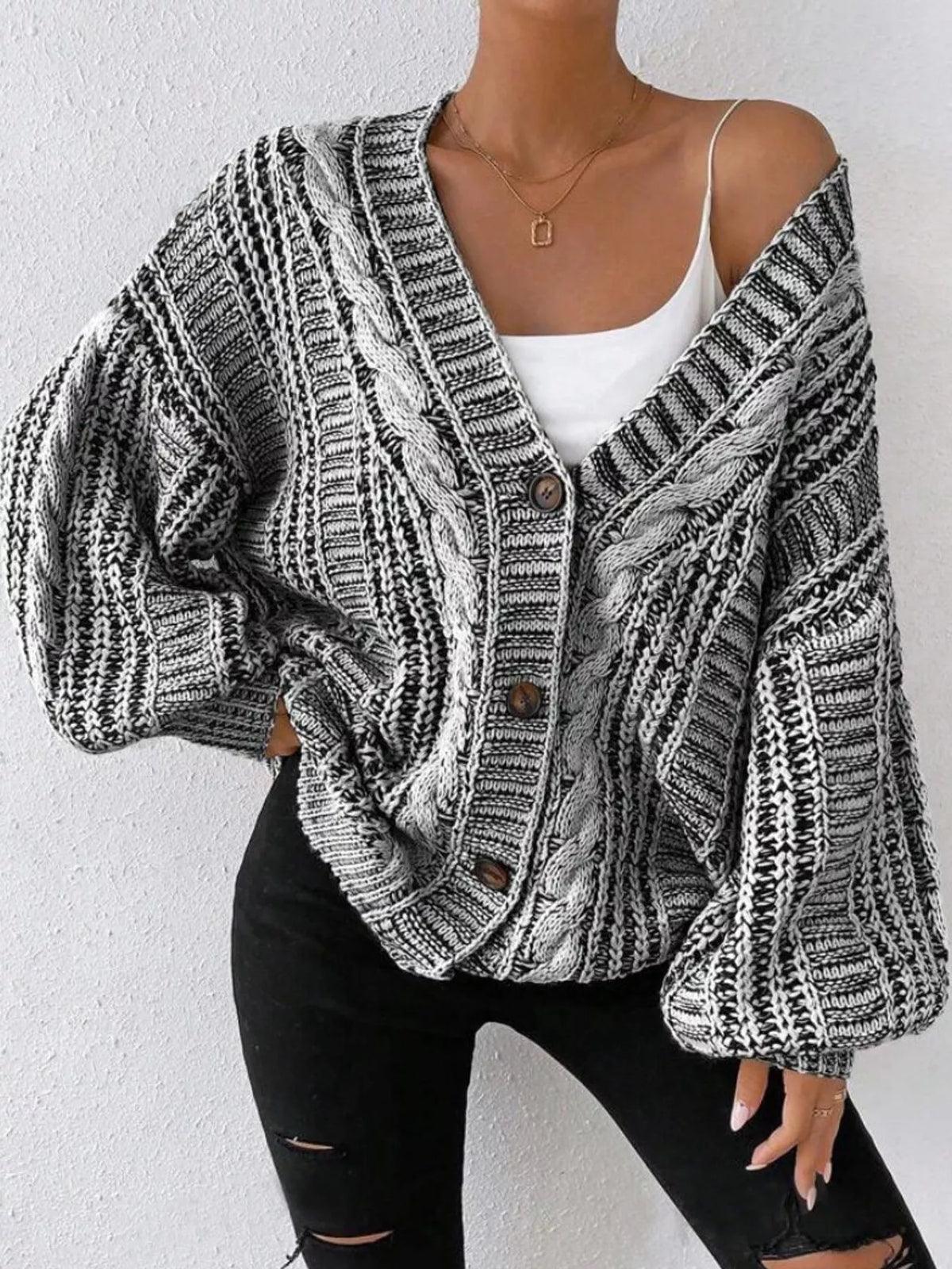 Gray chunky cable knit button down cardigan, front view