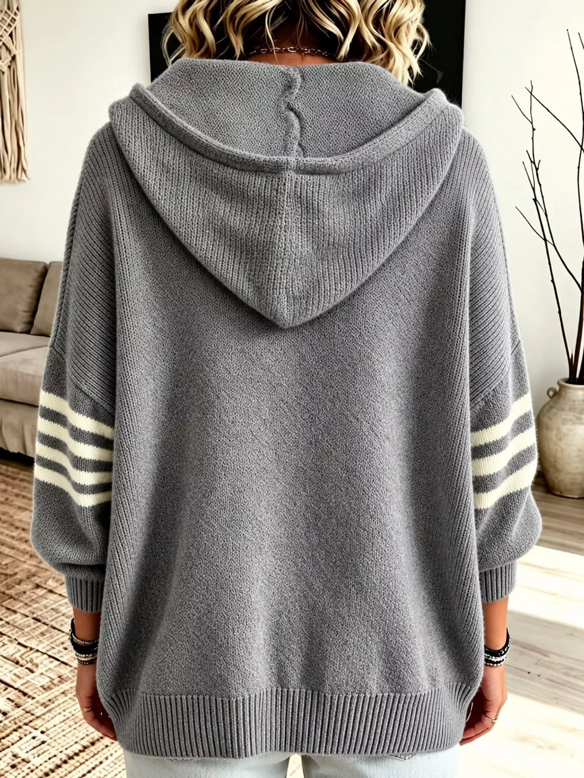 Gray hooded zip-up knit cardigan, back view