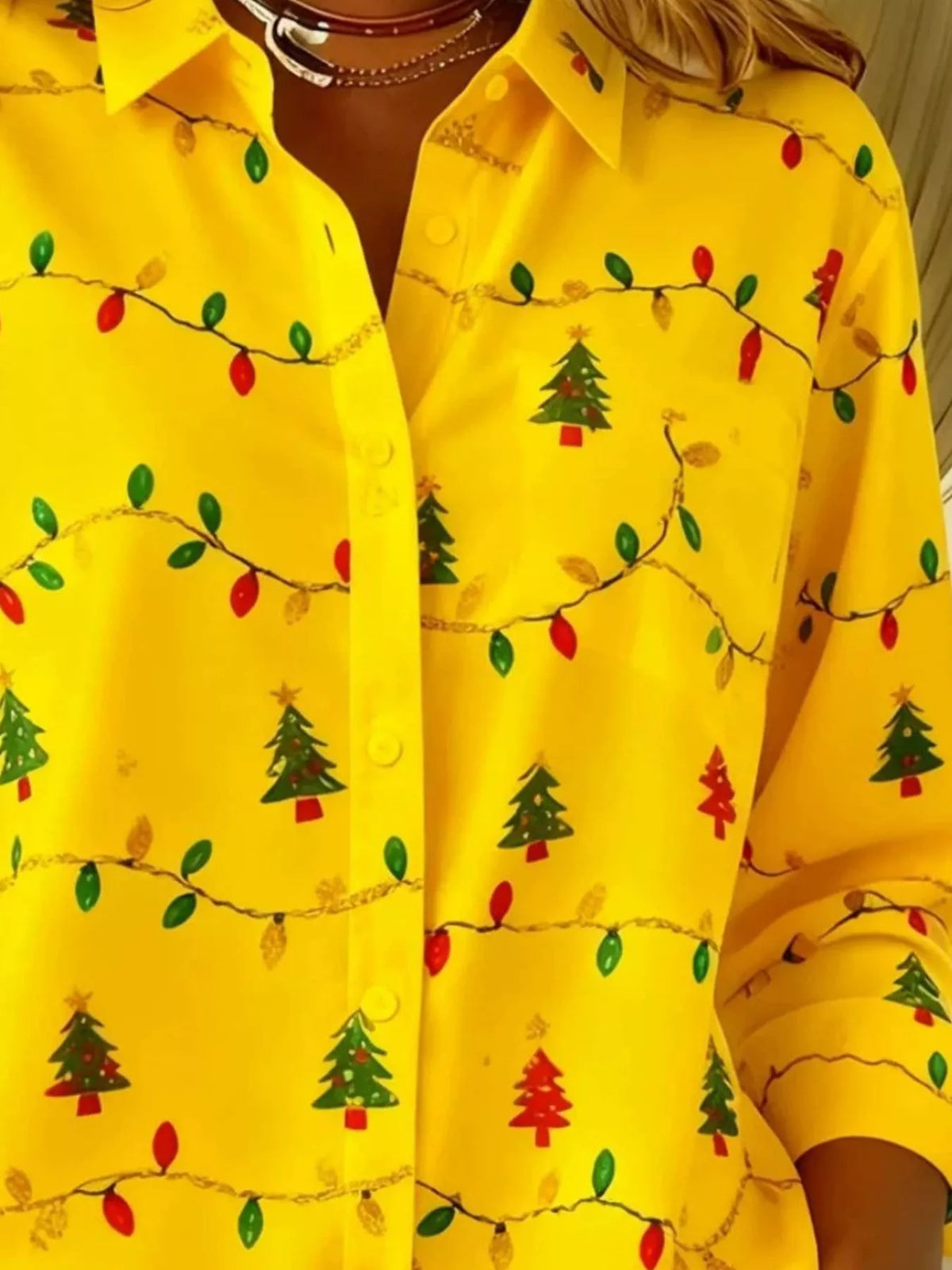 Yellow christmas tree button-down shirt, collar and holiday print detail.