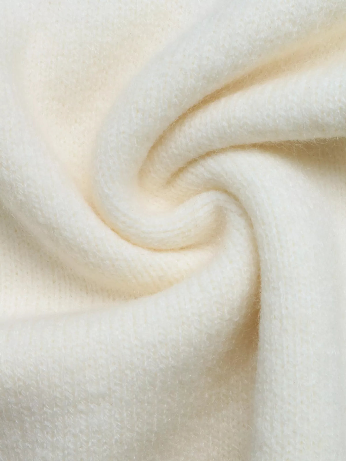 Cream Fair Isle round neck sweater, knit fabric close-up