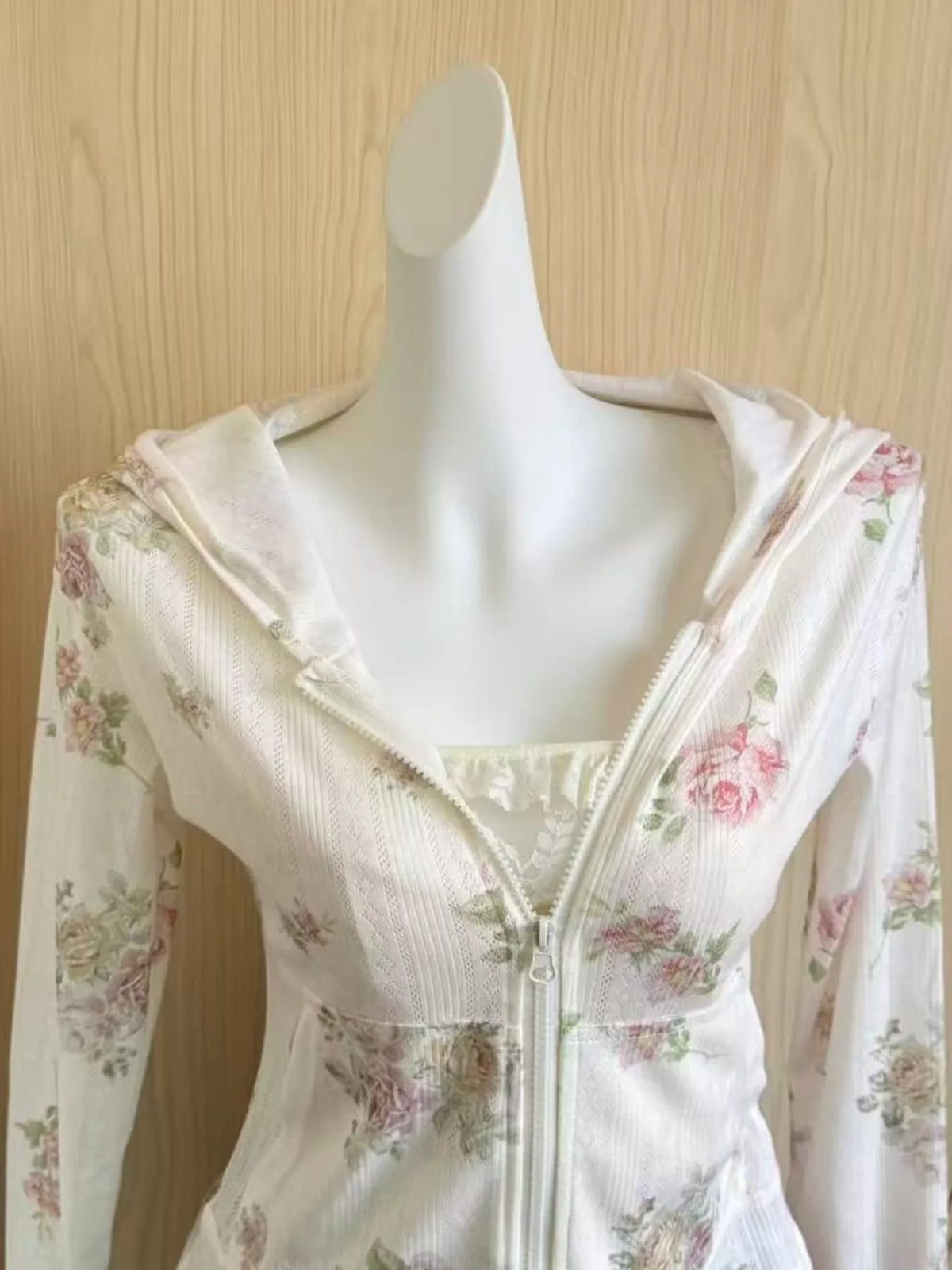 White floral print zip-up knit hoodie, detail view