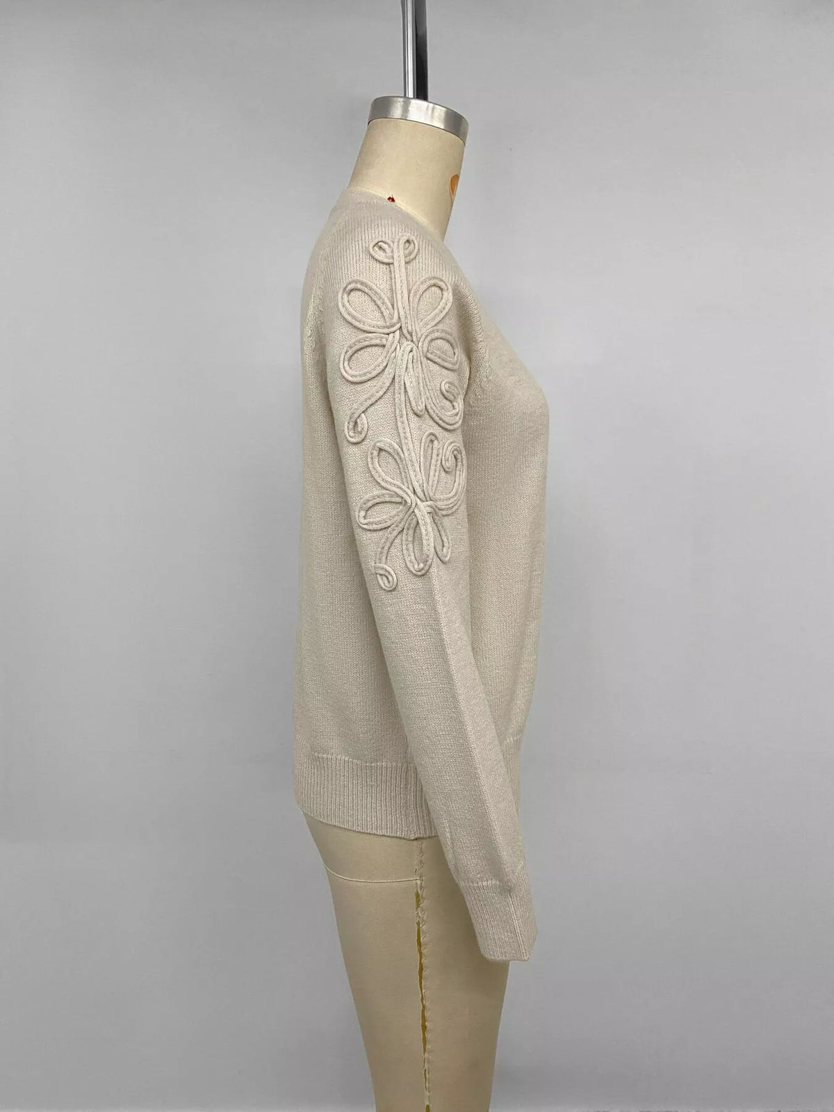 Cream floral raglan sleeve sweater, side on mannequin