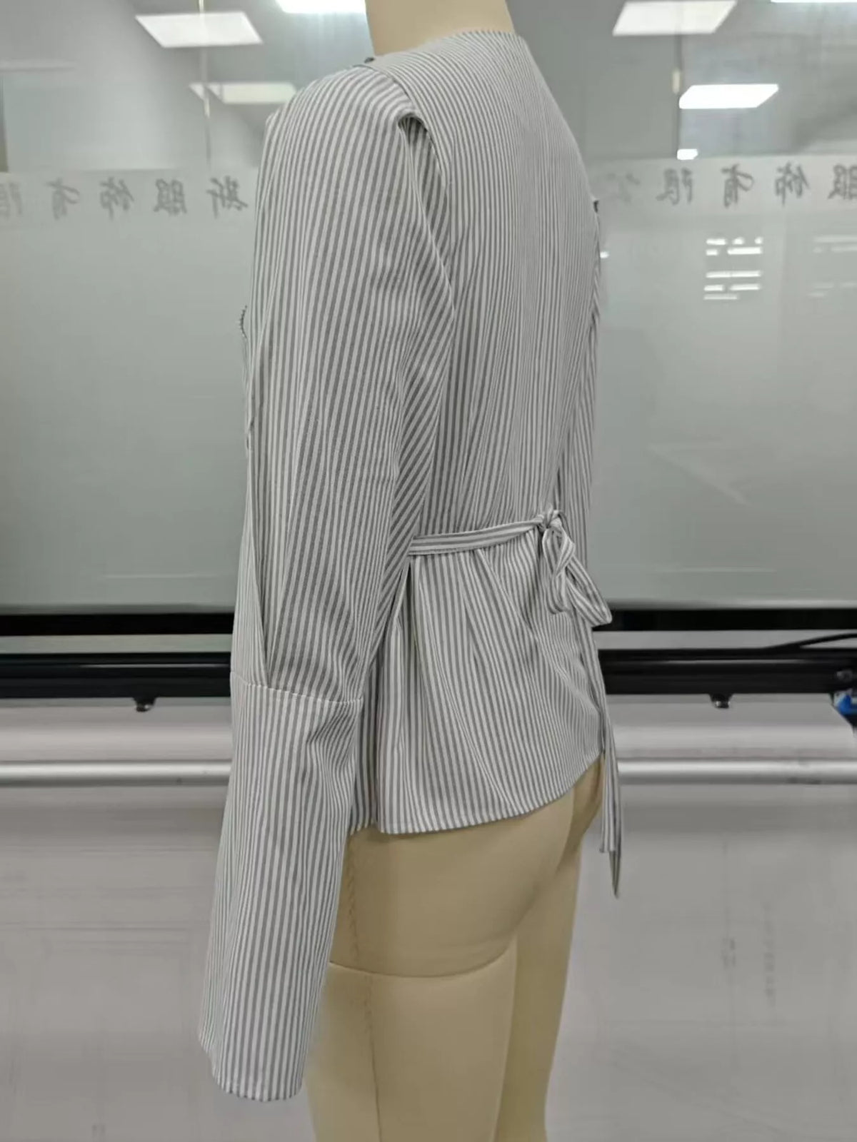 V-neck long sleeve blouse, side view