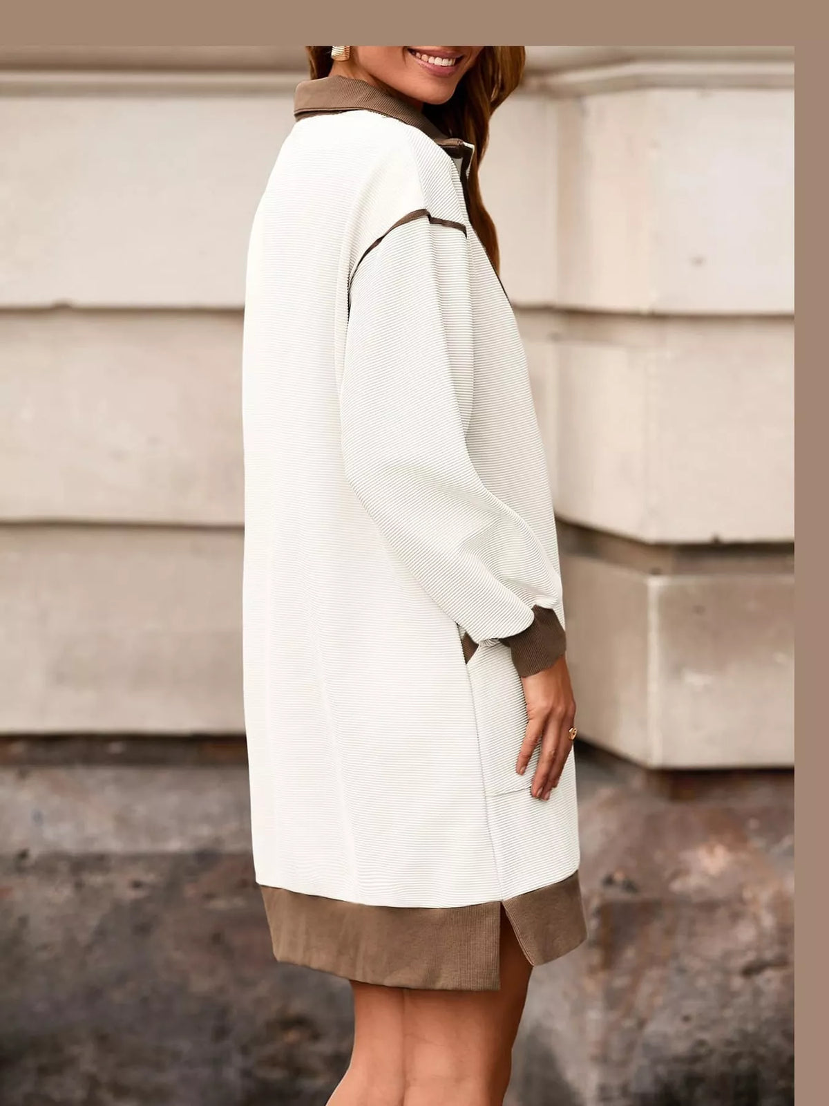 White and tan color block quarter-zip sweatshirt dress — back view