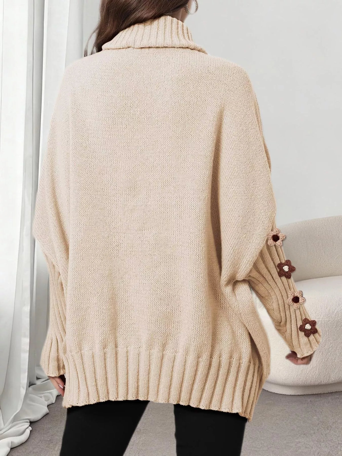 Beige oversized floral sleeve turtleneck sweater, back view