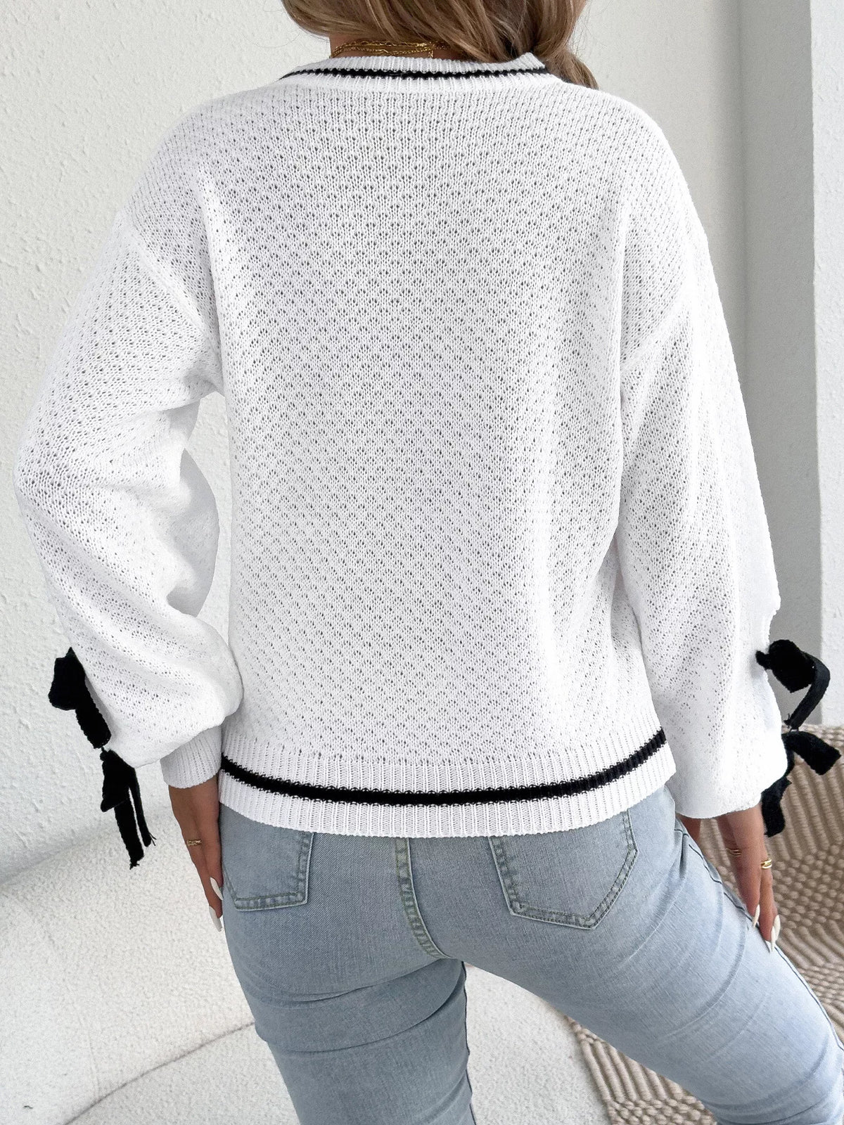 Contrast bow-tie sleeve crew neck sweater, back view