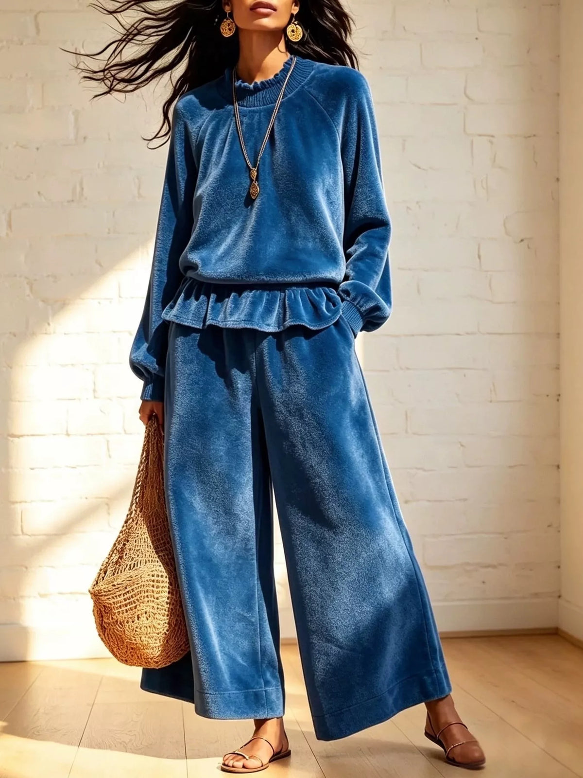 Blue velvet ruffled hem top and wide-leg pants set — front view