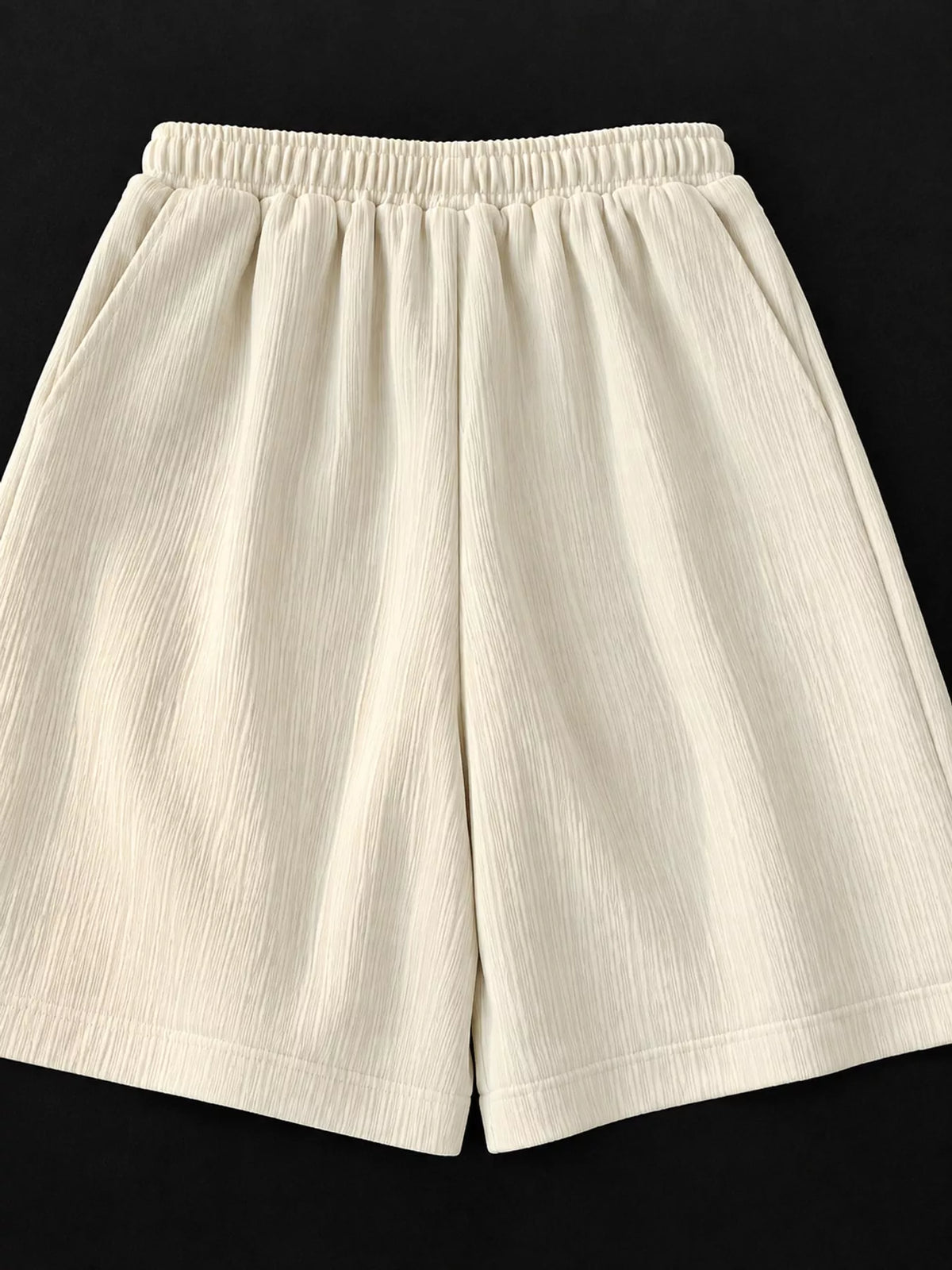 Women's Textured Drawstring Casual Shorts in cream — back flat lay view
