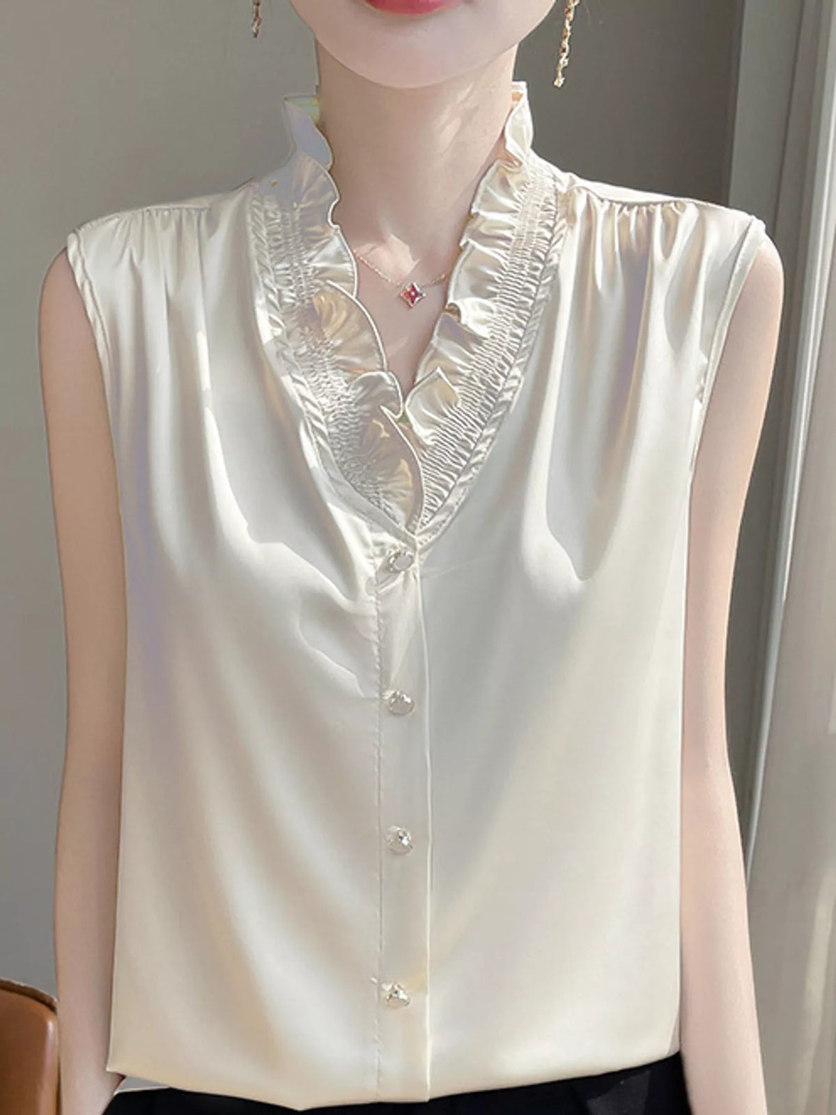 Sleeveless Ruffled V-Neck Satin Shirt — front view