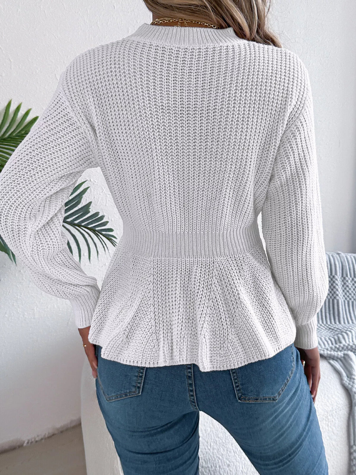 Cable Knit Peplum Sweater in white, back view