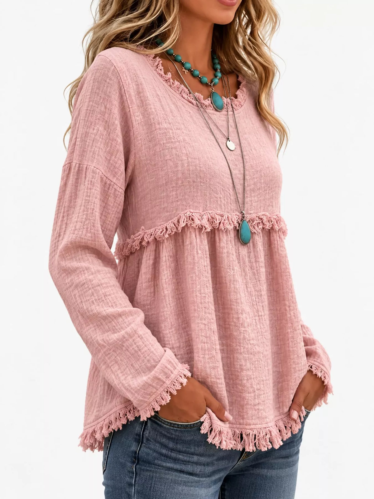 Pink frayed hem textured blouse, side view