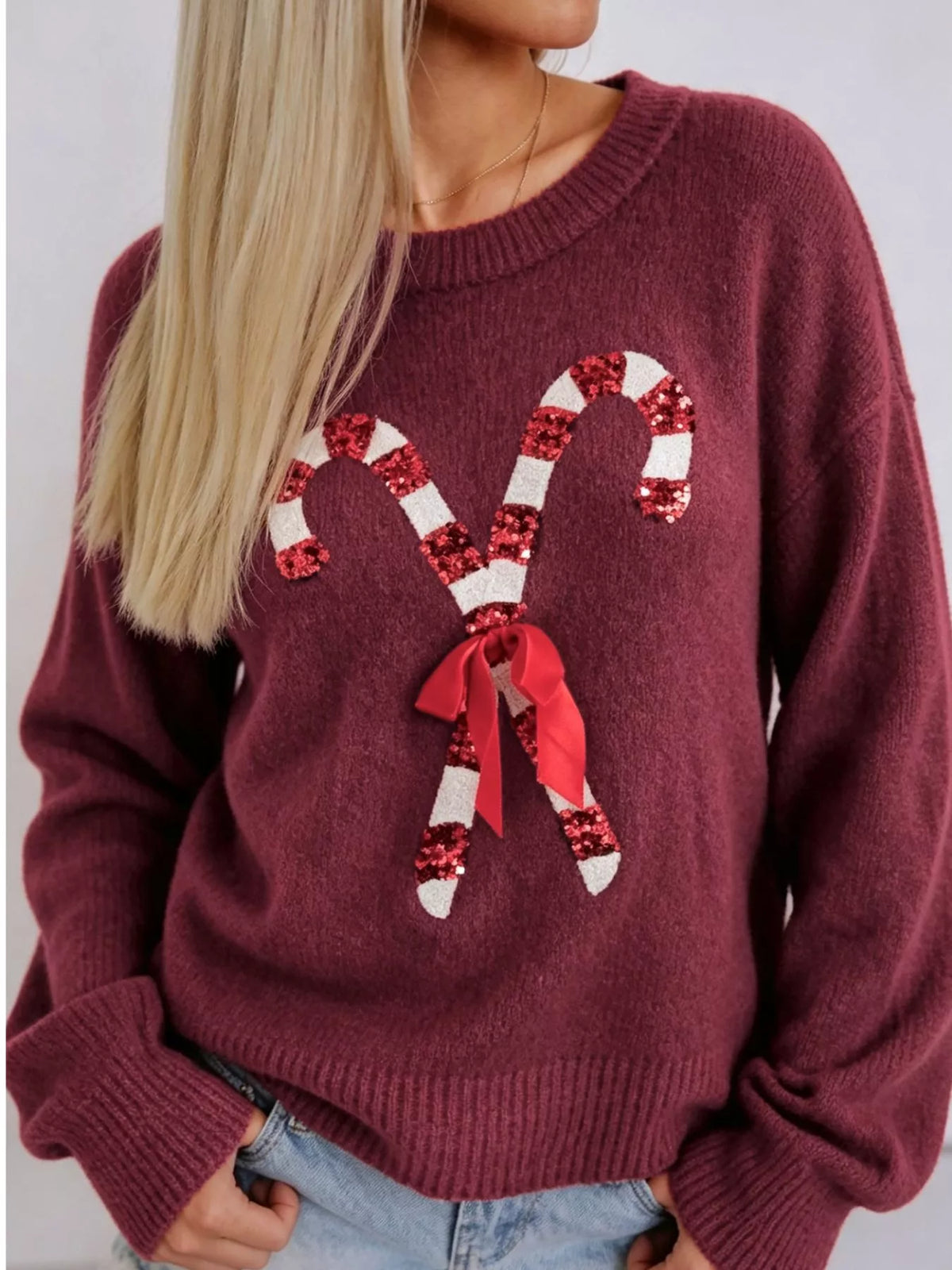 Burgundy christmas sequin candy cane sweater — front view