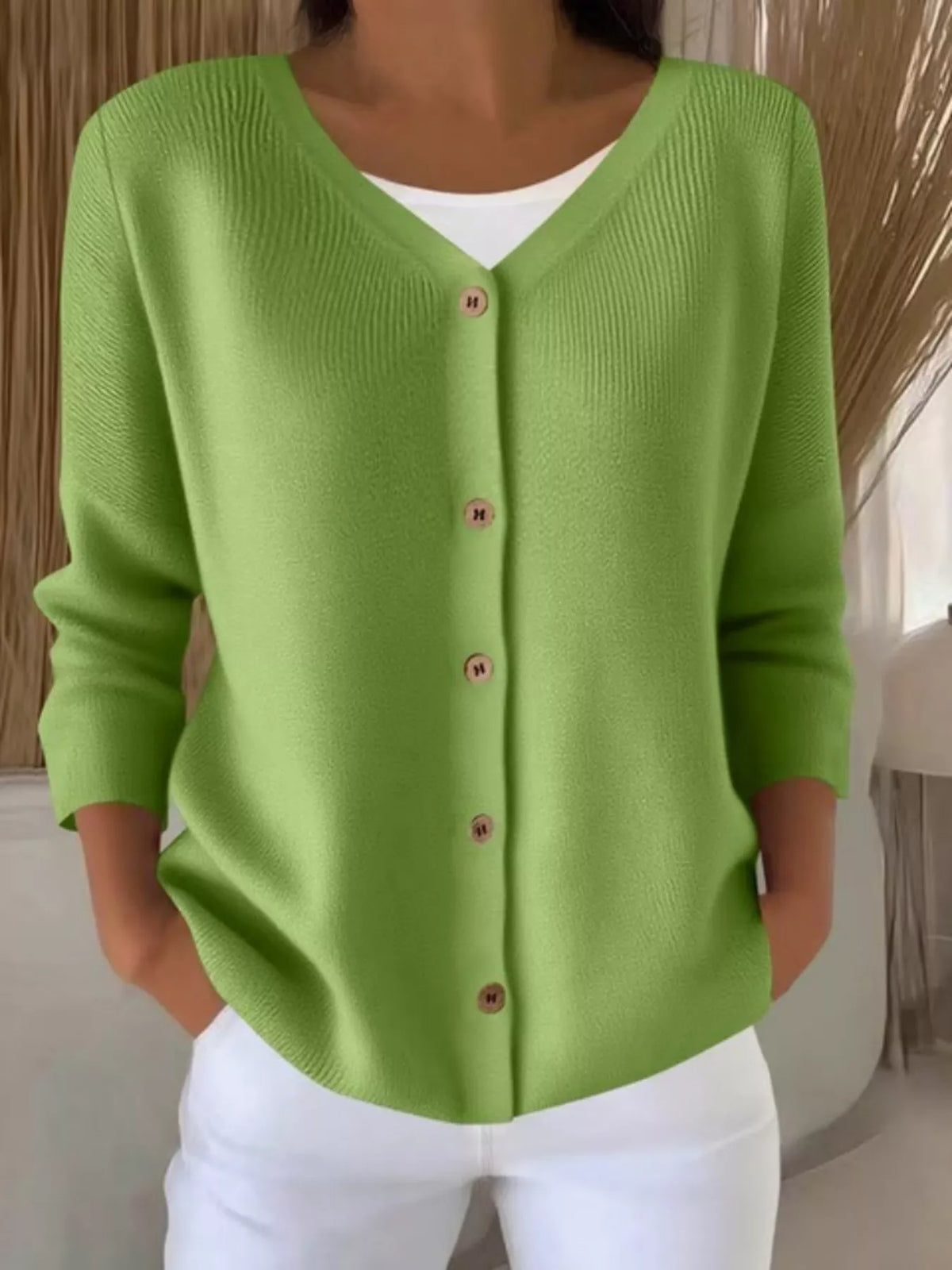 Green ribbed button-front cardigan, front view