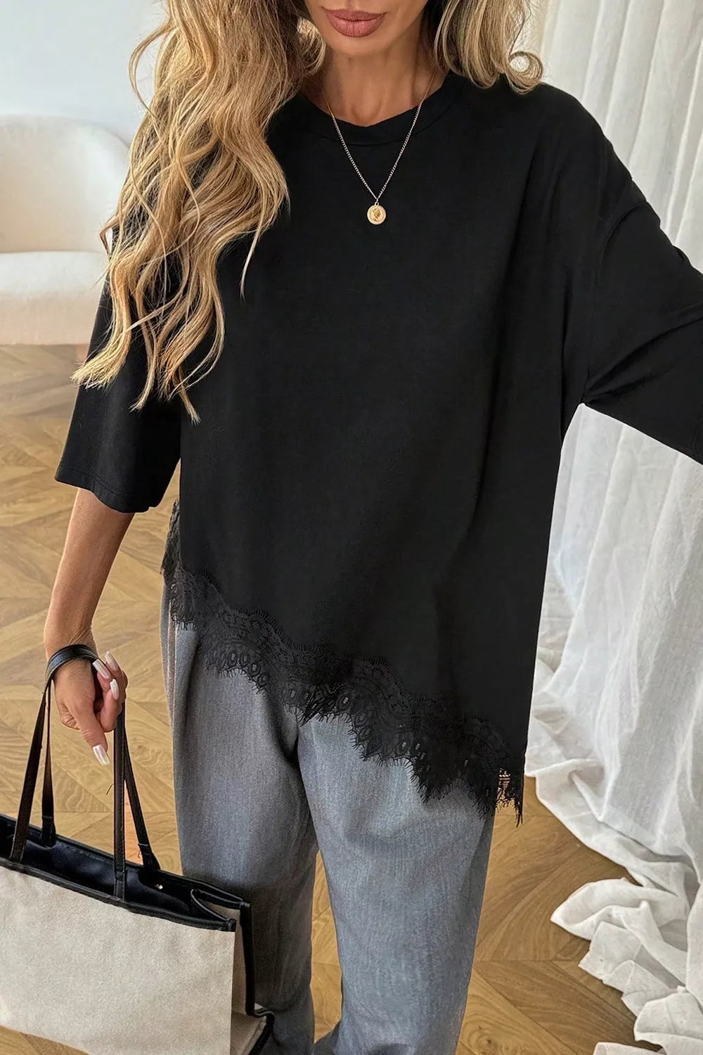 Trendsi Lace Asymmetrical Hem Round Neck T-Shirt -