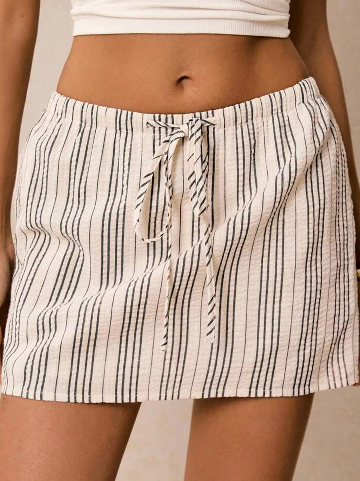 Striped skort, black striped angled front