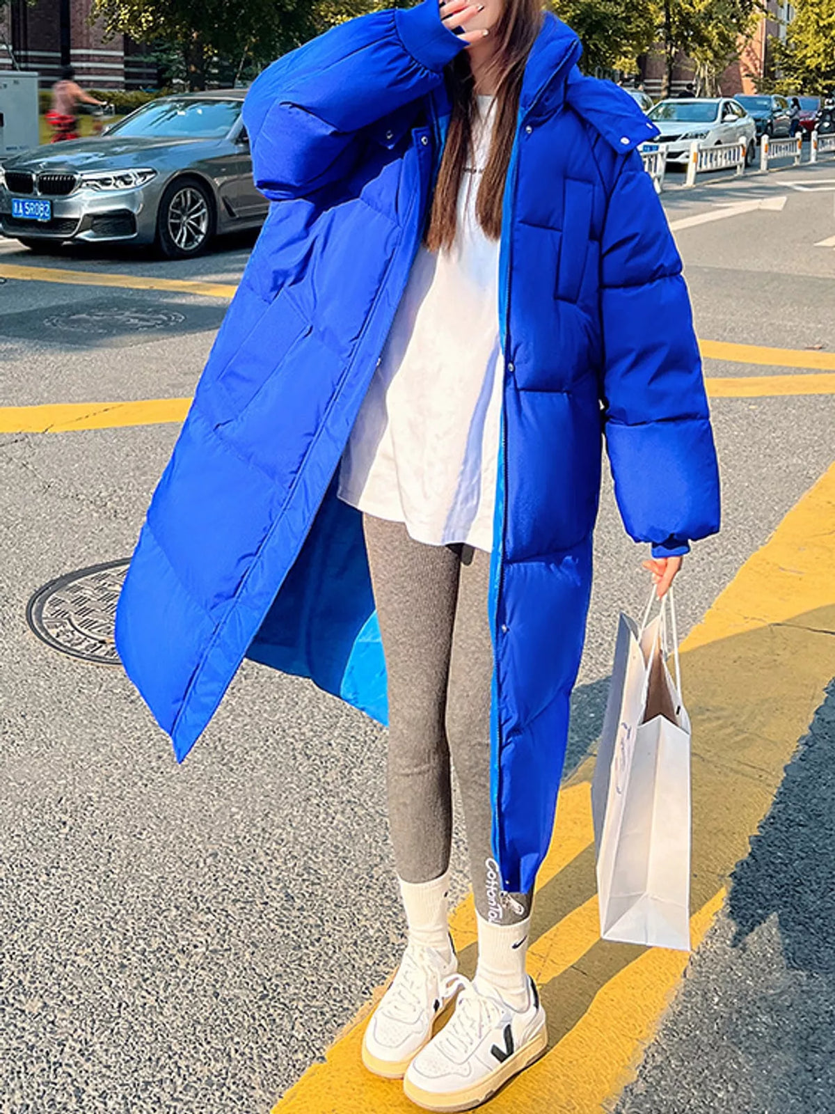 Longline puffer coat, blue front