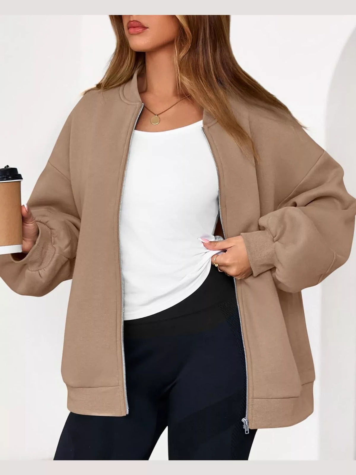 Tan oversized zip-up jacket — front view
