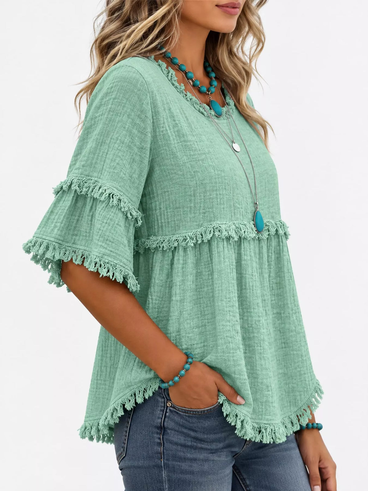 Green frayed edge textured blouse, side view