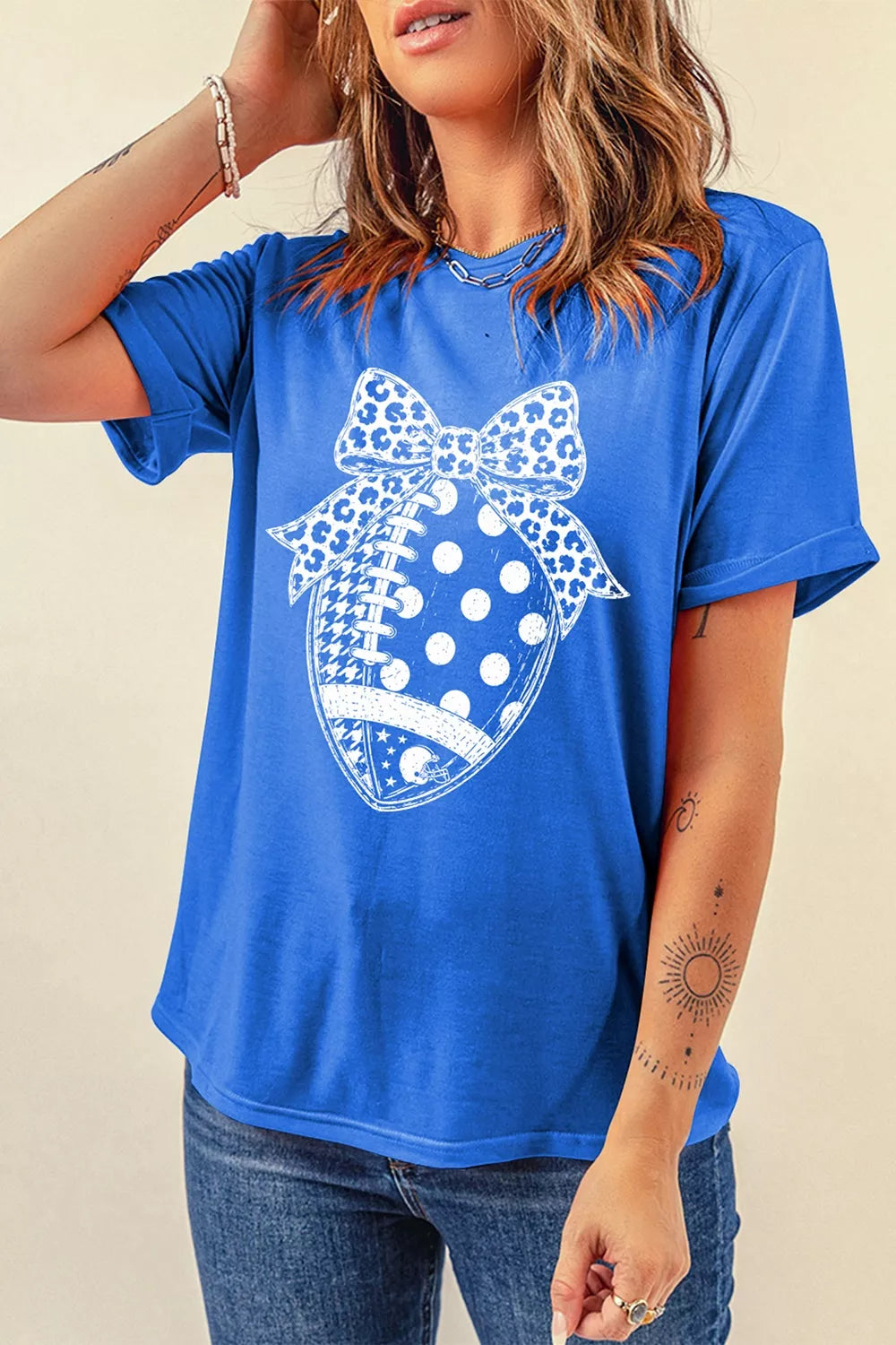 Women's leopard bow polka dot football graphic game day T-shirt