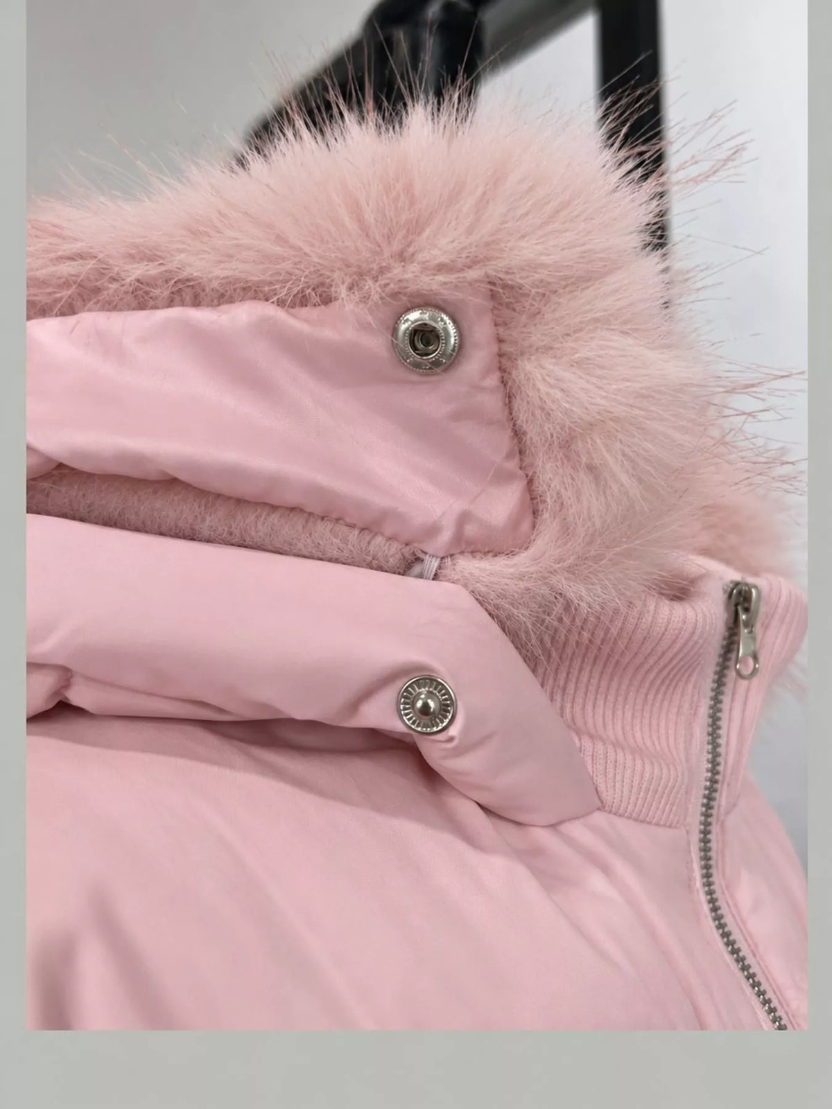 Faux Fur Hooded Puffer Jacket — garment construction details