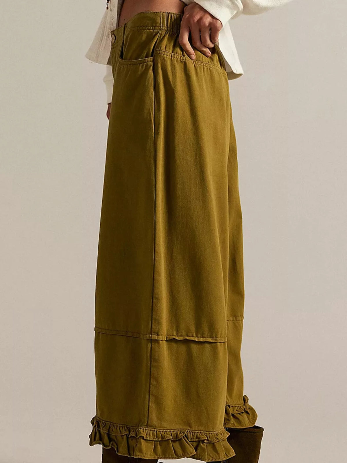 Olive wide-leg ruffle-hem jeans, side view