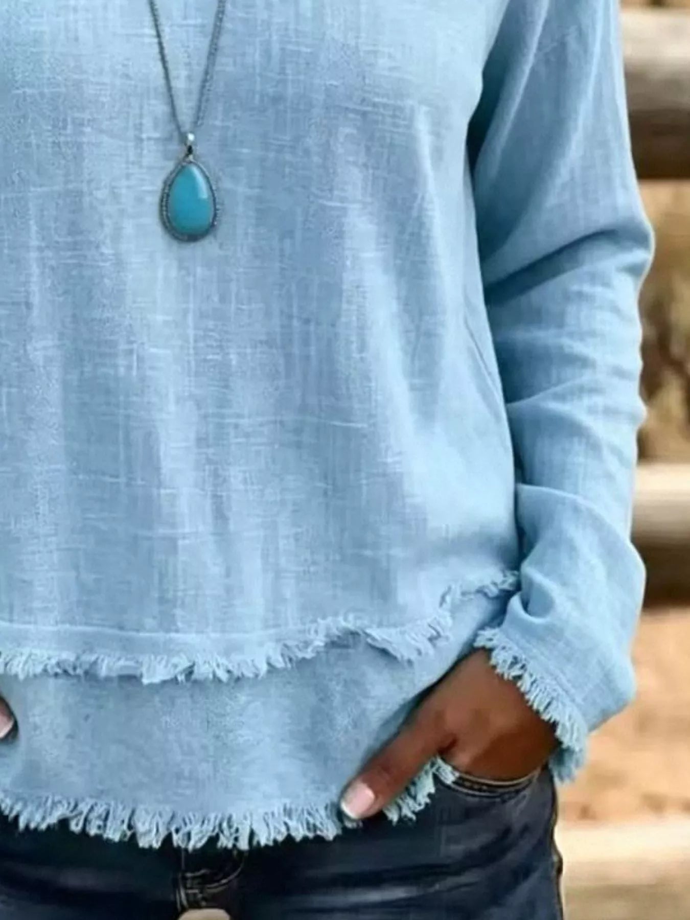 Trendsi V-Neck Long Sleeve Blouse with Frayed Hem Detail -