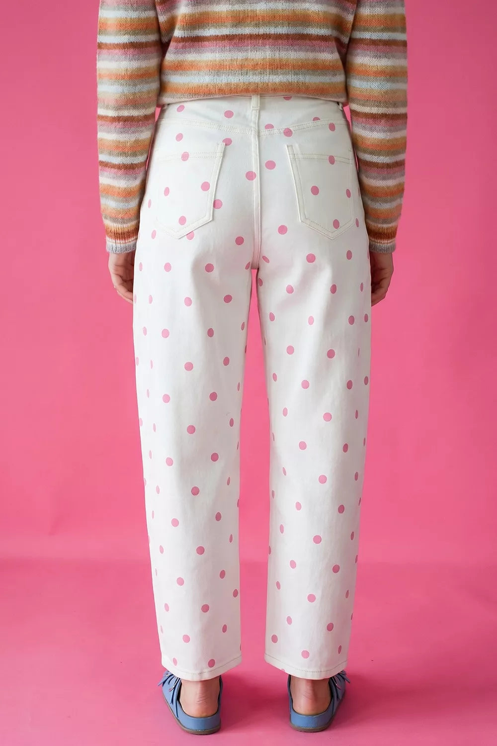 White with pink dots polka-dot cropped jeans, back view against pink background