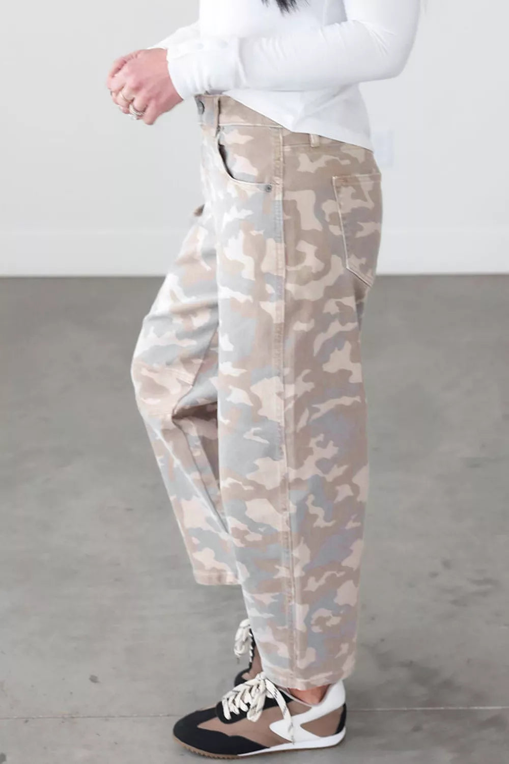 Beige camouflage barrel jeans, side view