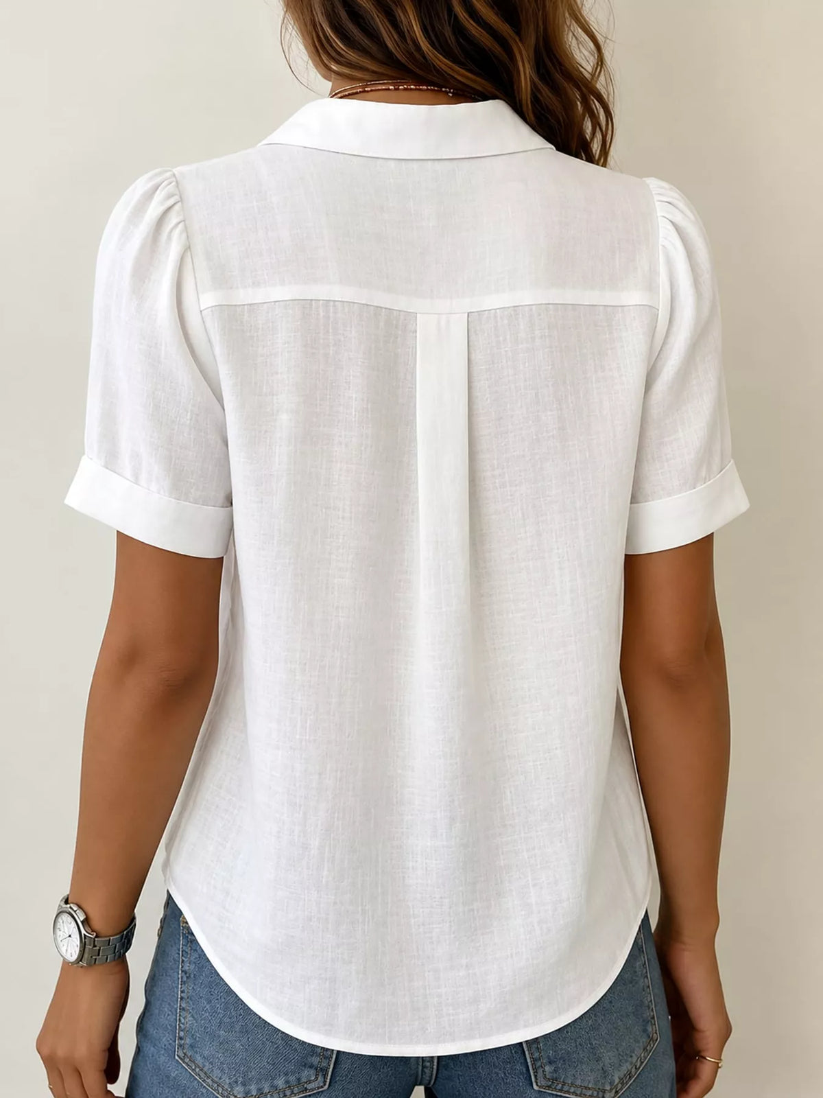 White button up short sleeve shirt, back view