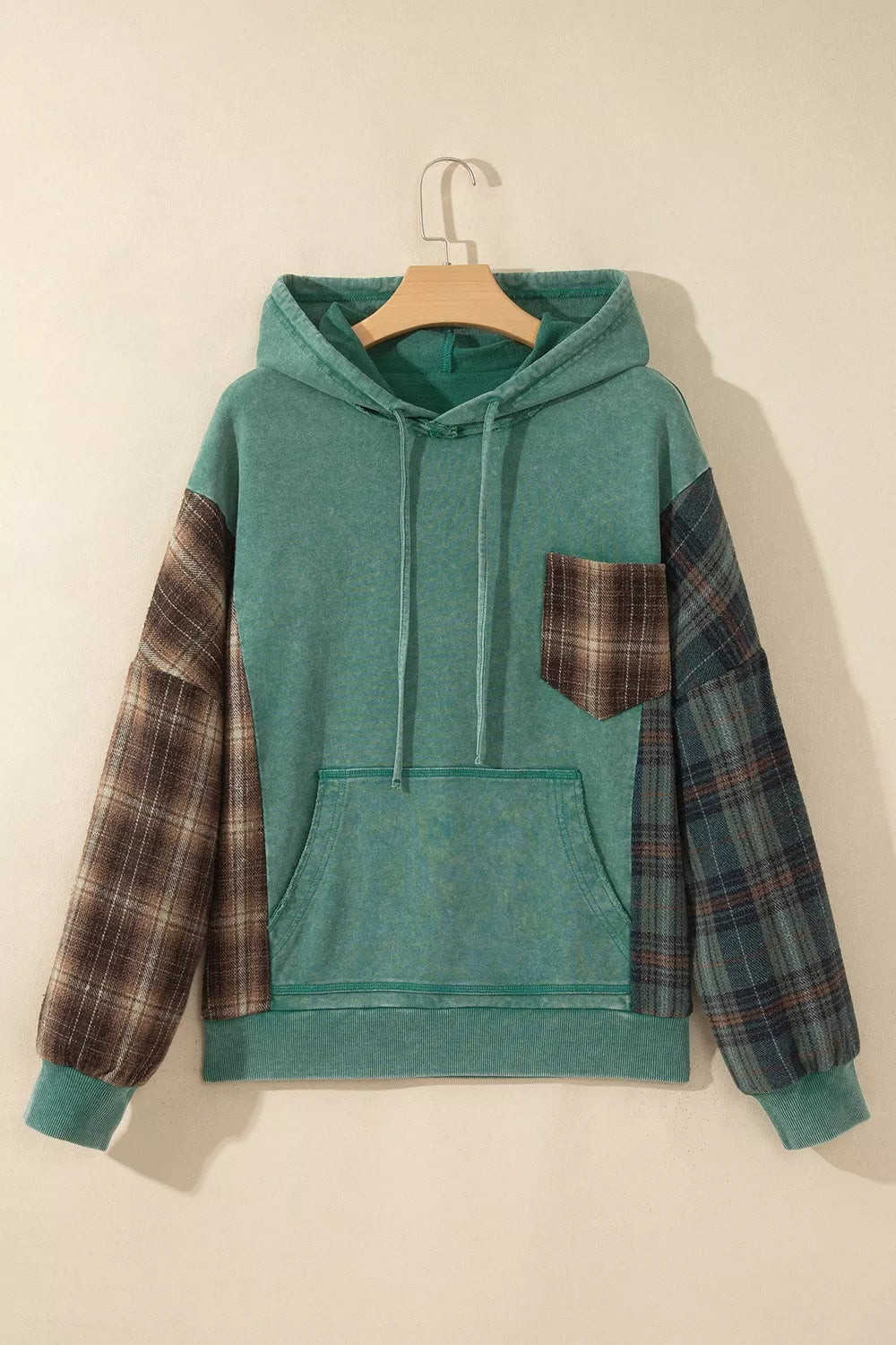 Plaid Kangaroo Pocket Hoodie in green, hanger front view
