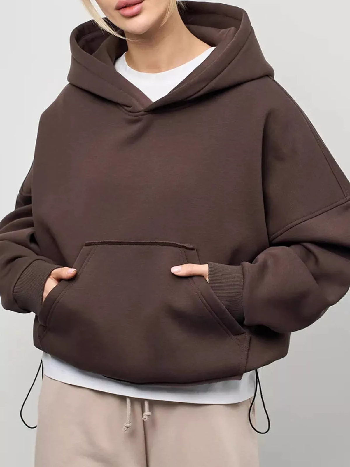 Kangaroo Pocket Drawcord Hem Hoodie in brown, front view
