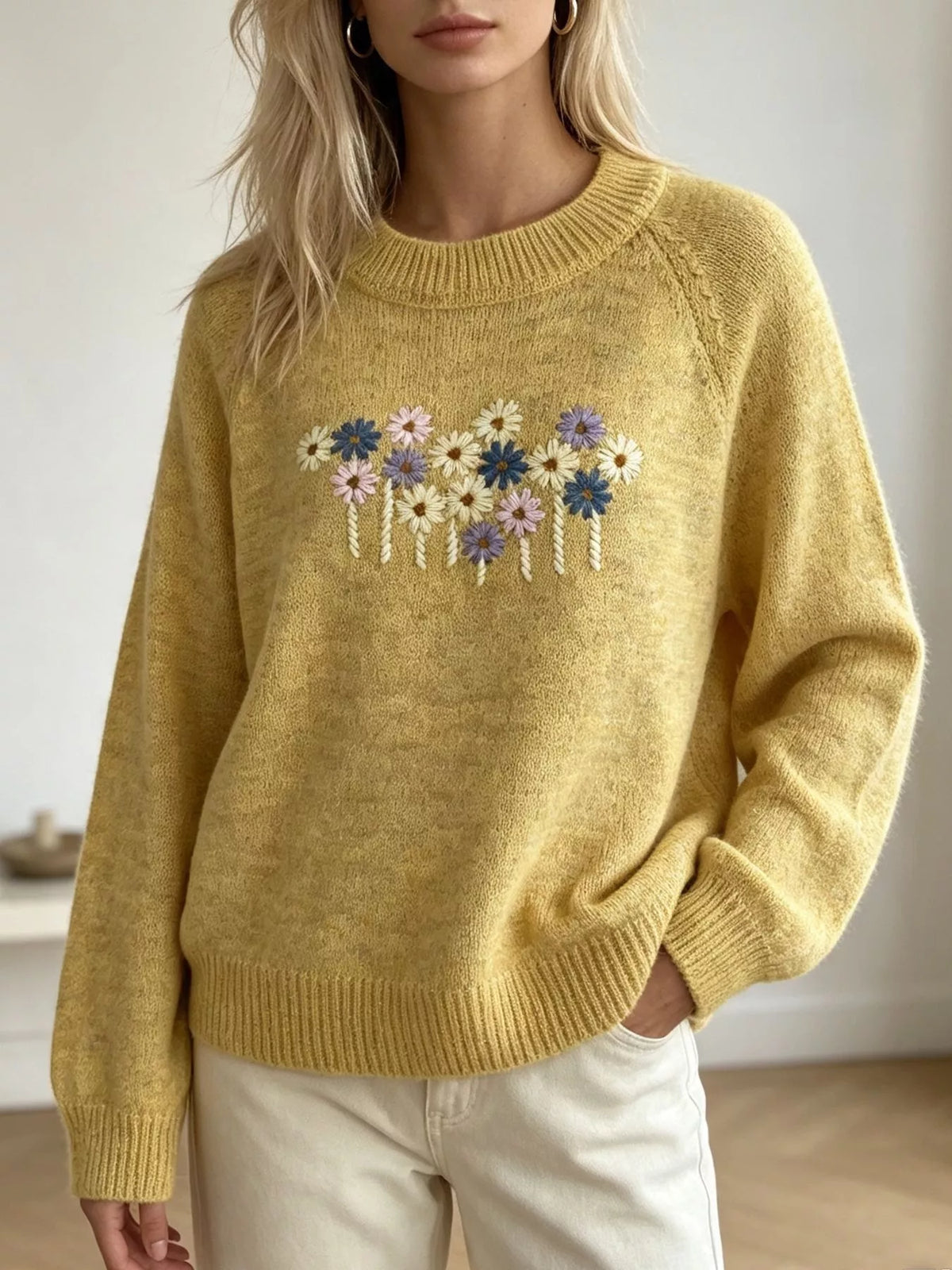 Floral embroidered round-neck sweater in yellow, front view