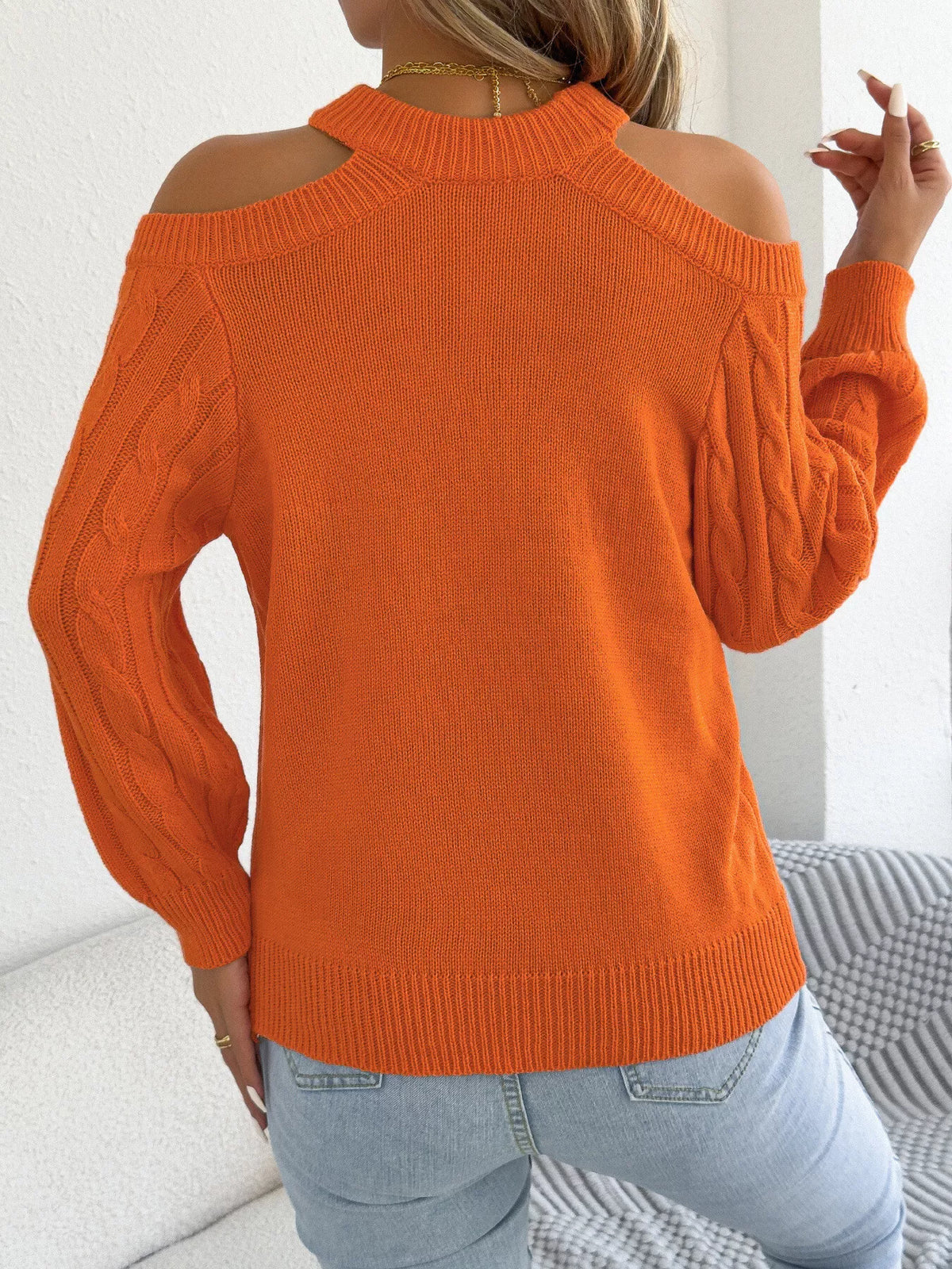 Cold Shoulder Cable Knit Sweater in orange, back view