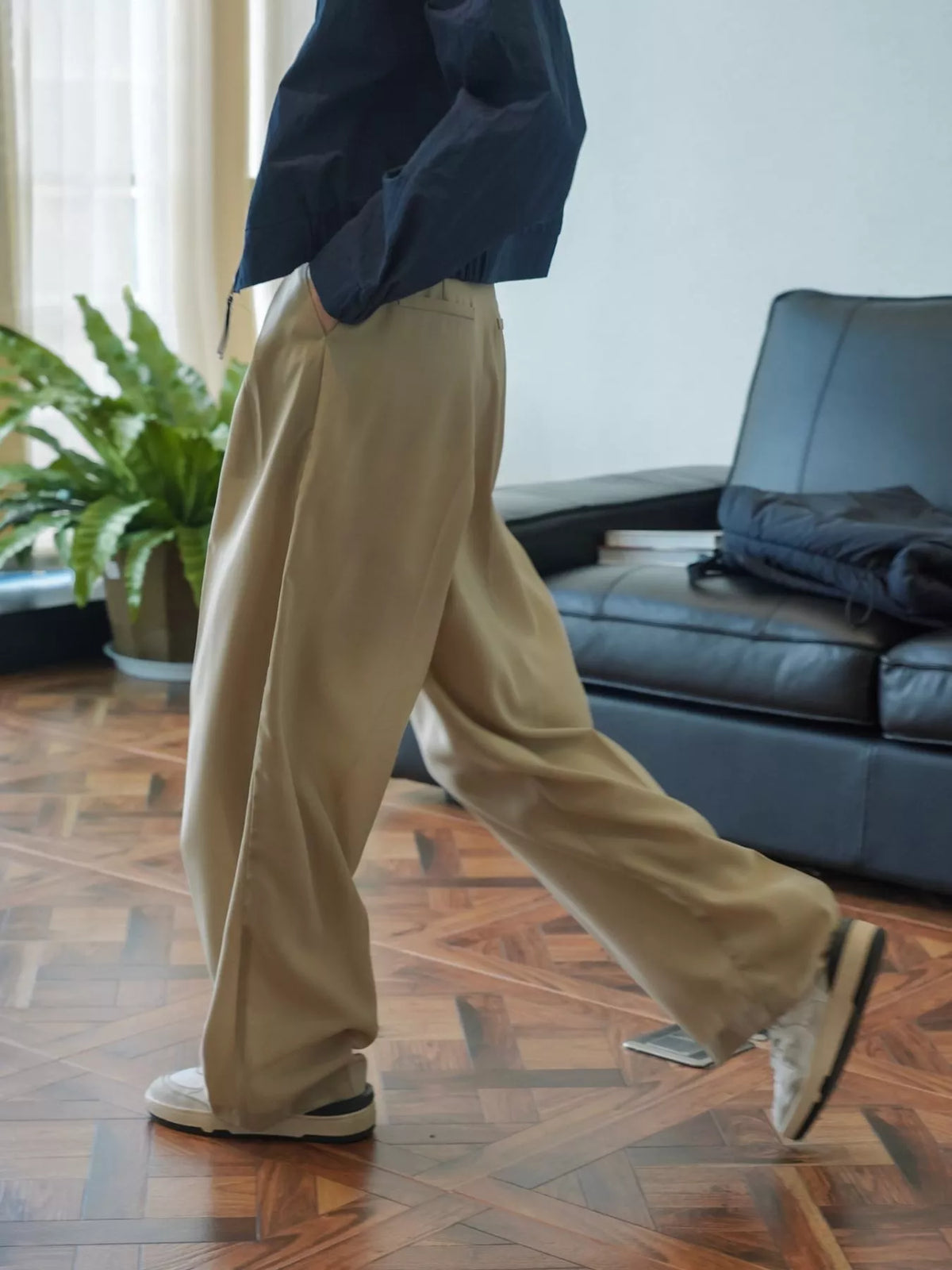 Women's High-Waisted Pleated Wide-Leg Pants in beige — side view